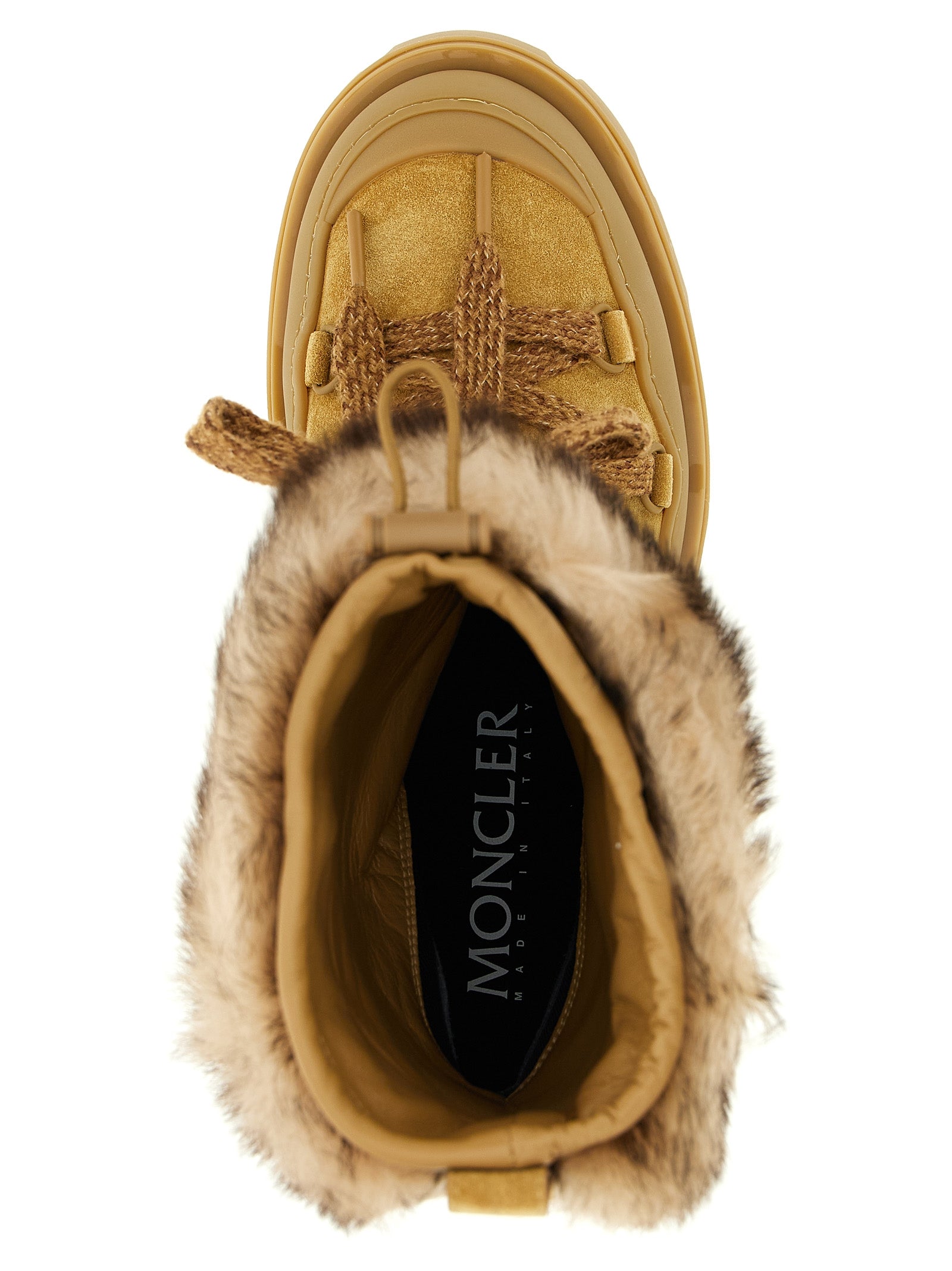 Step into the realm of elegance with Moncler's Brown Calfskin Flat Boots, where luxurious shearling meets exquisite craftsmanship for the discerning individual.