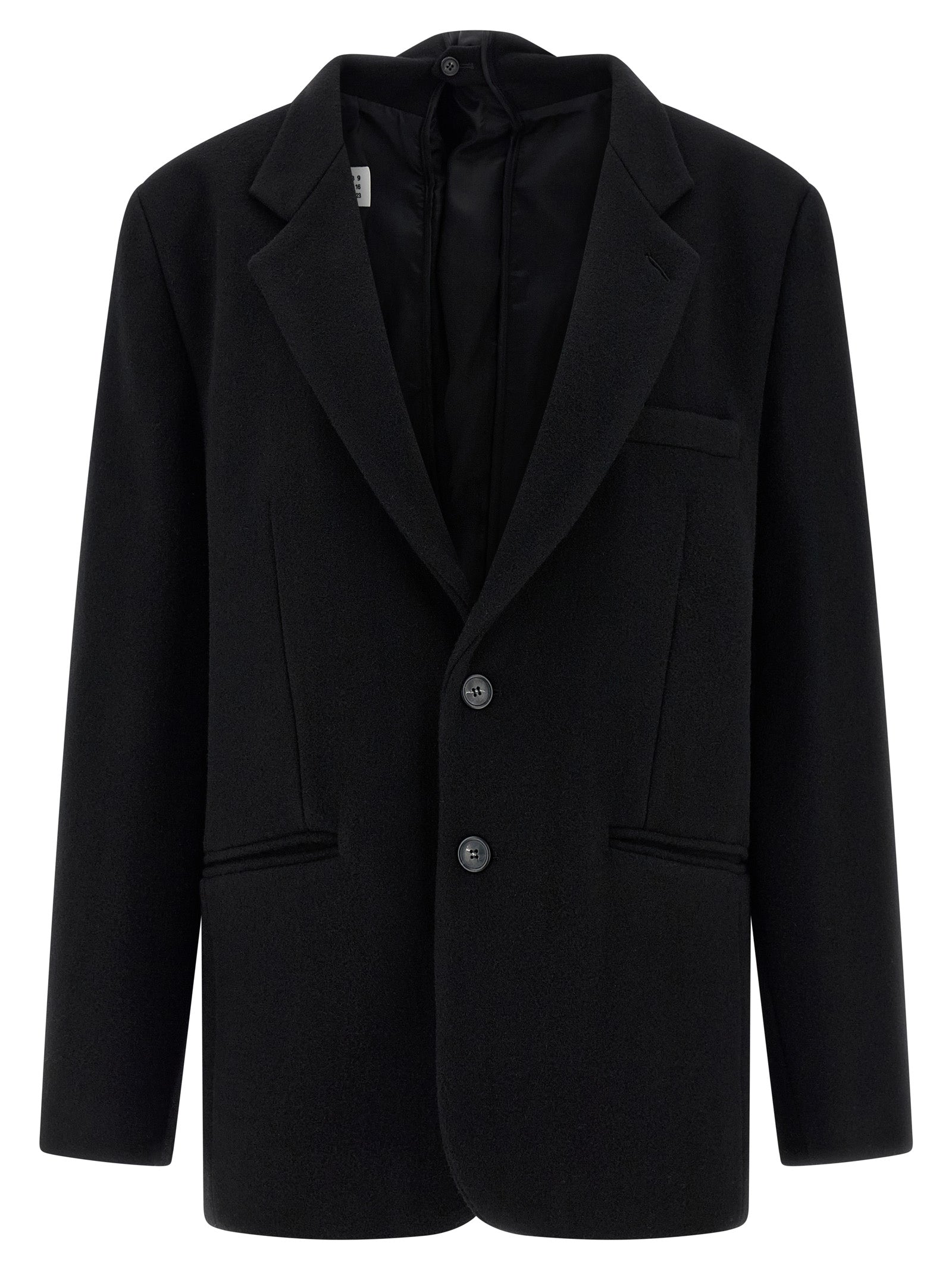 Experience the allure of the MM6 Maison Margiela Black Virgin Wool Blazer, crafted in Italy from luxurious virgin wool, embodying sophistication and timeless elegance for the discerning individual.