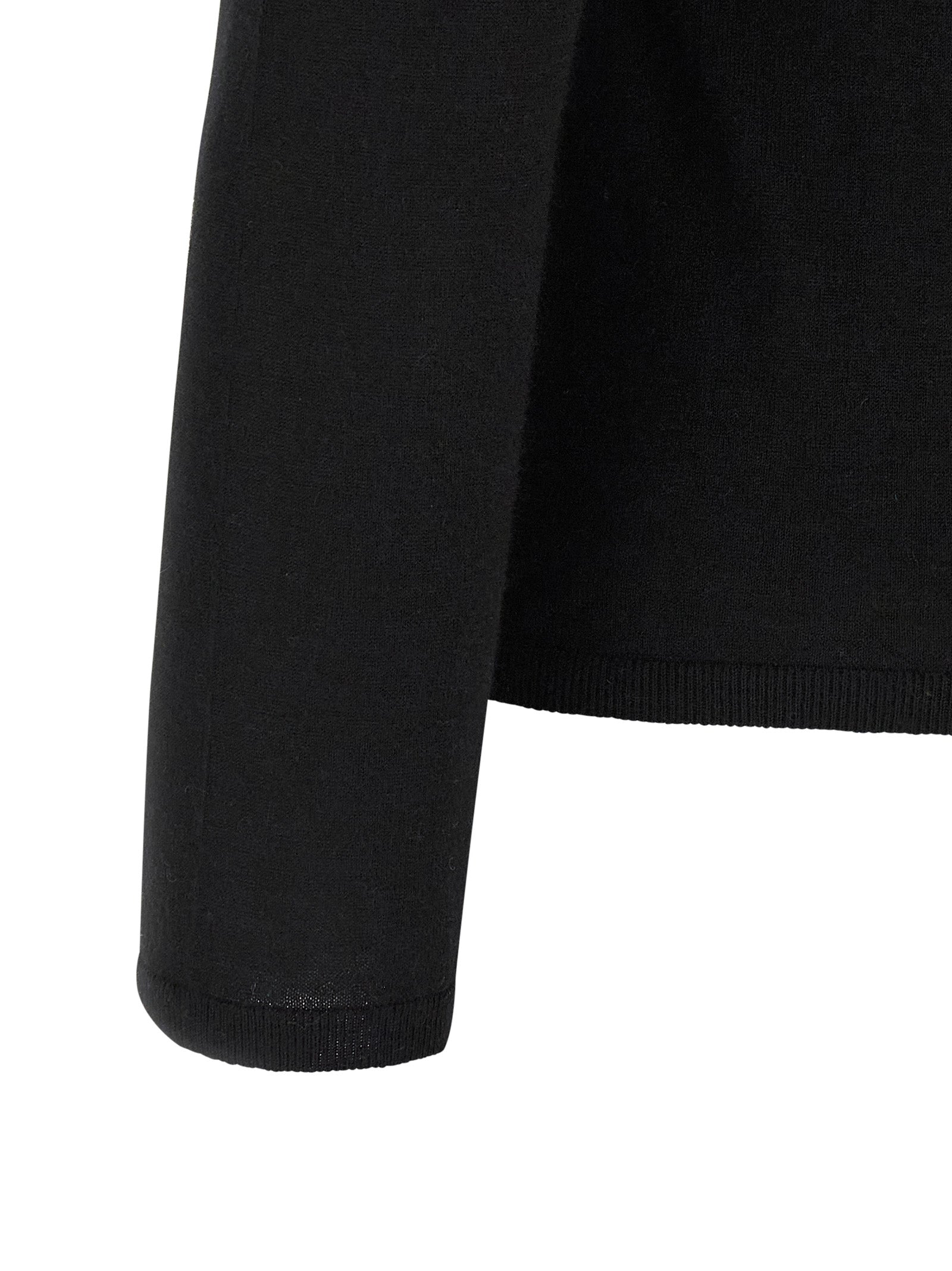 Indulge in the exquisite Max Mara Black Cashmere Cardigan, crafted from pure cashmere for a luxurious embrace that elevates any occasion with timeless elegance.