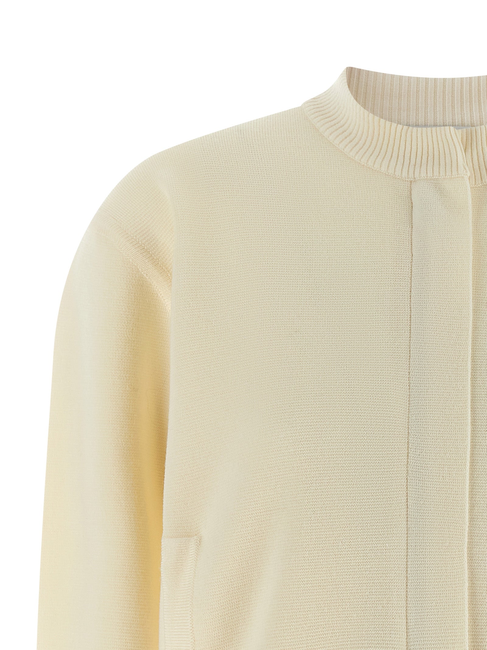 Elevate your wardrobe with the Max Mara White Virgin Wool Cardigan, a luxurious blend of elegance and comfort, perfect for sophisticated style seekers.
