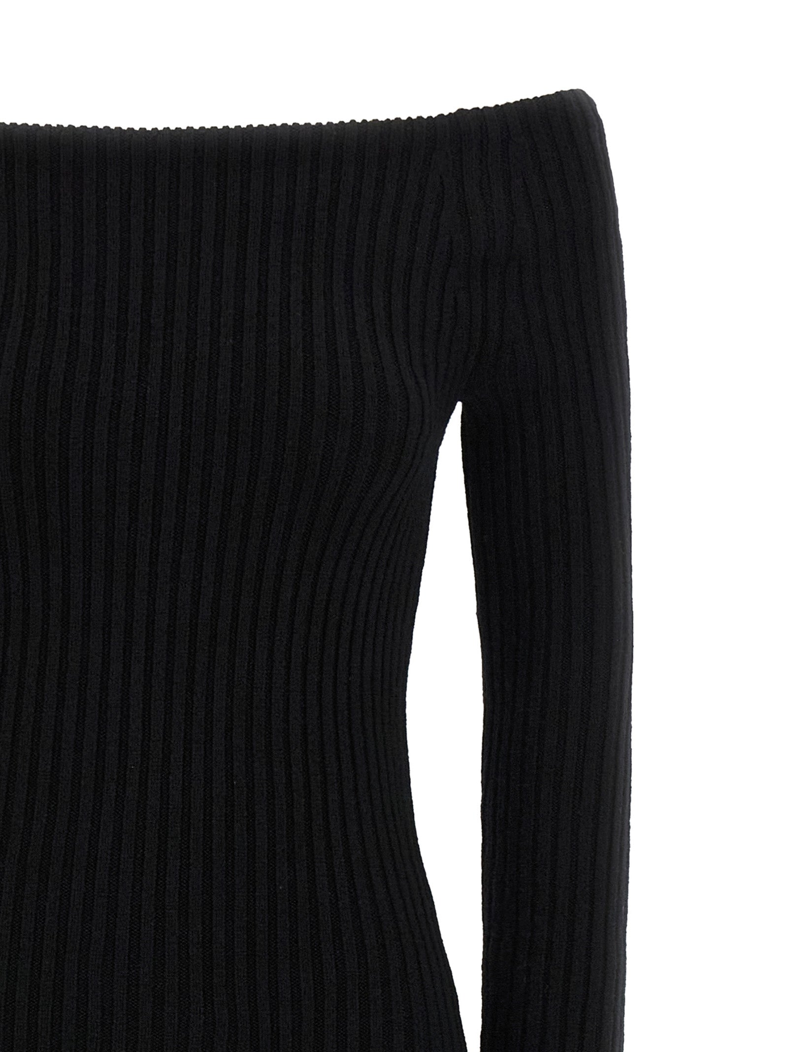 Experience the allure of the Max Mara Black Wool Long Dress, a luxurious blend of wool and cashmere, embodying timeless elegance and sophisticated charm for any occasion.