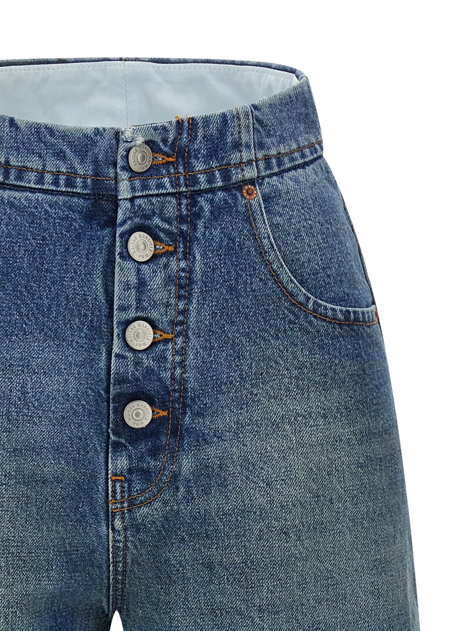 Experience the allure of MM6 Maison Margiela's Blue Cotton Straight-Leg Jeans, where premium craftsmanship meets timeless elegance, perfect for the discerning fashion connoisseur.
