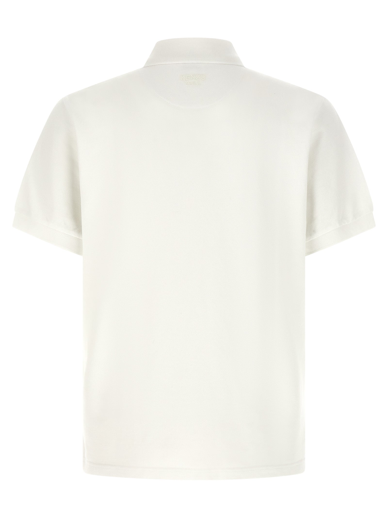 Elevate your style with the Kenzo White Cotton Polo Shirt, a masterpiece of artisanal luxury crafted in Portugal, embodying timeless elegance and bold sophistication.