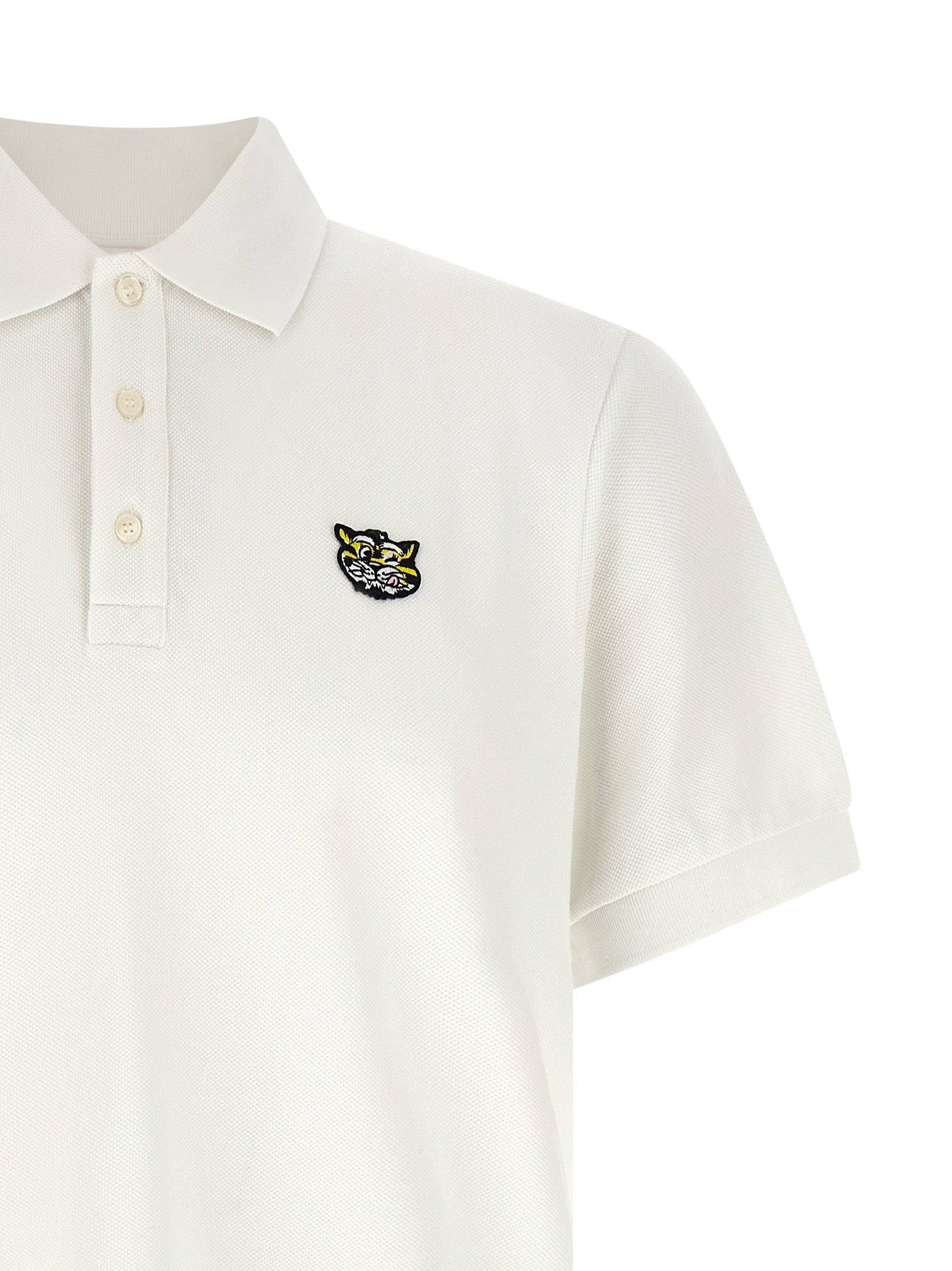 Elevate your wardrobe with the Kenzo White Cotton Polo Shirt, a masterpiece of artisanal luxury, crafted from pure cotton for timeless elegance and bold sophistication.