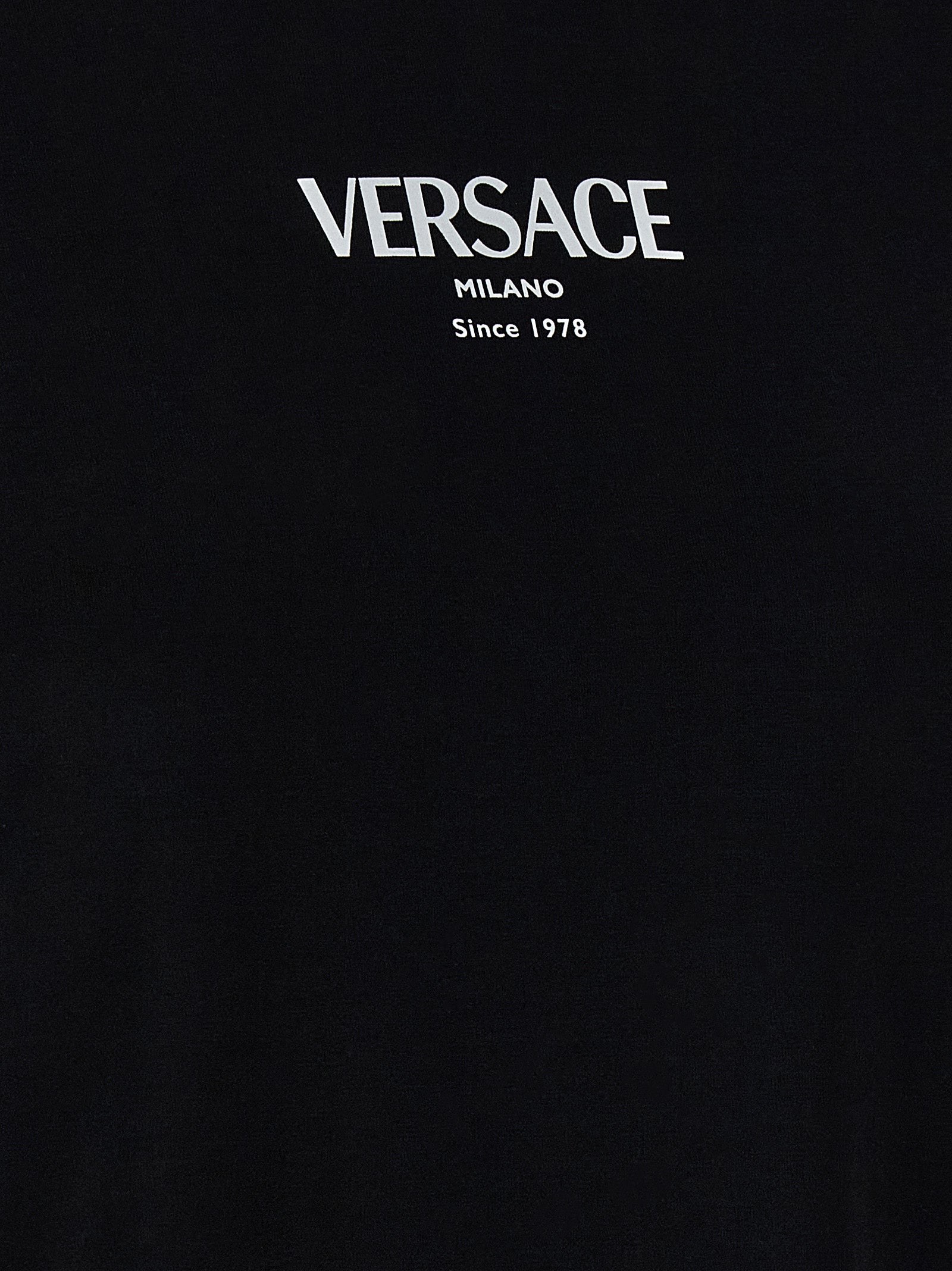 Indulge in the Versace Bicolor Viscose T-Shirt, a luxurious blend of comfort and elegance, crafted in Italy to elevate your wardrobe with timeless sophistication.