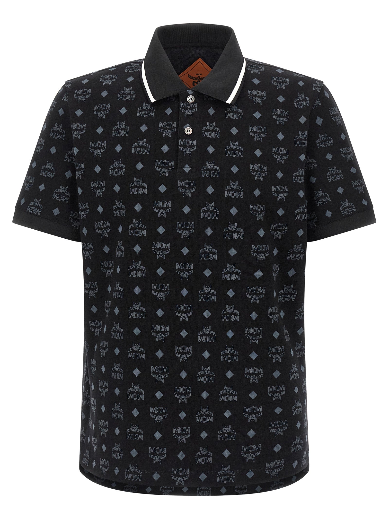 Indulge in the MCM Black Cotton Polo Shirt, a masterpiece of artisanal luxury crafted from 100% cotton, blending sophistication with contemporary elegance for the discerning individual.