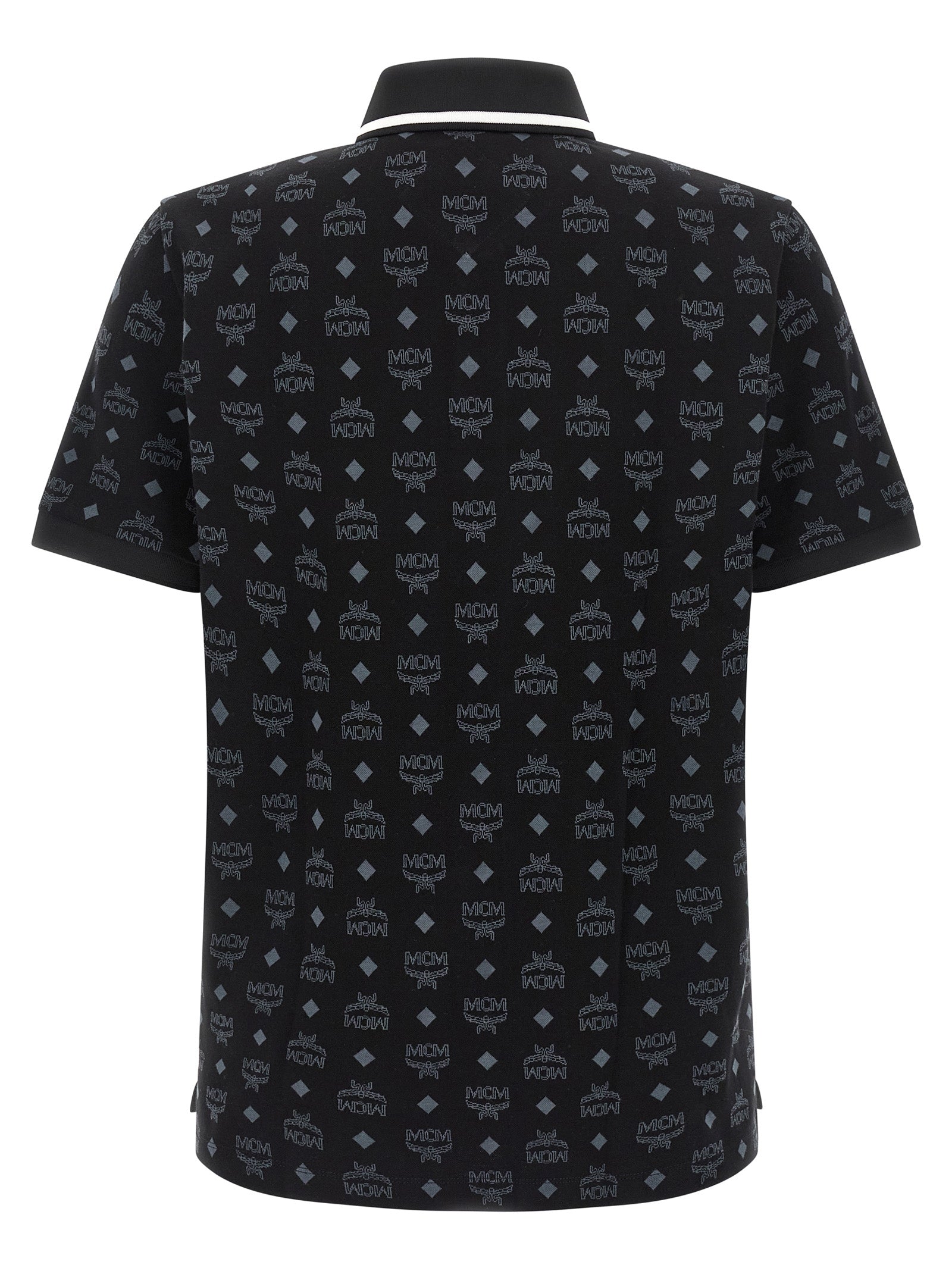 Elevate your wardrobe with the MCM Black Cotton Polo Shirt, a fusion of artisanal luxury and contemporary design, crafted for those who command attention.