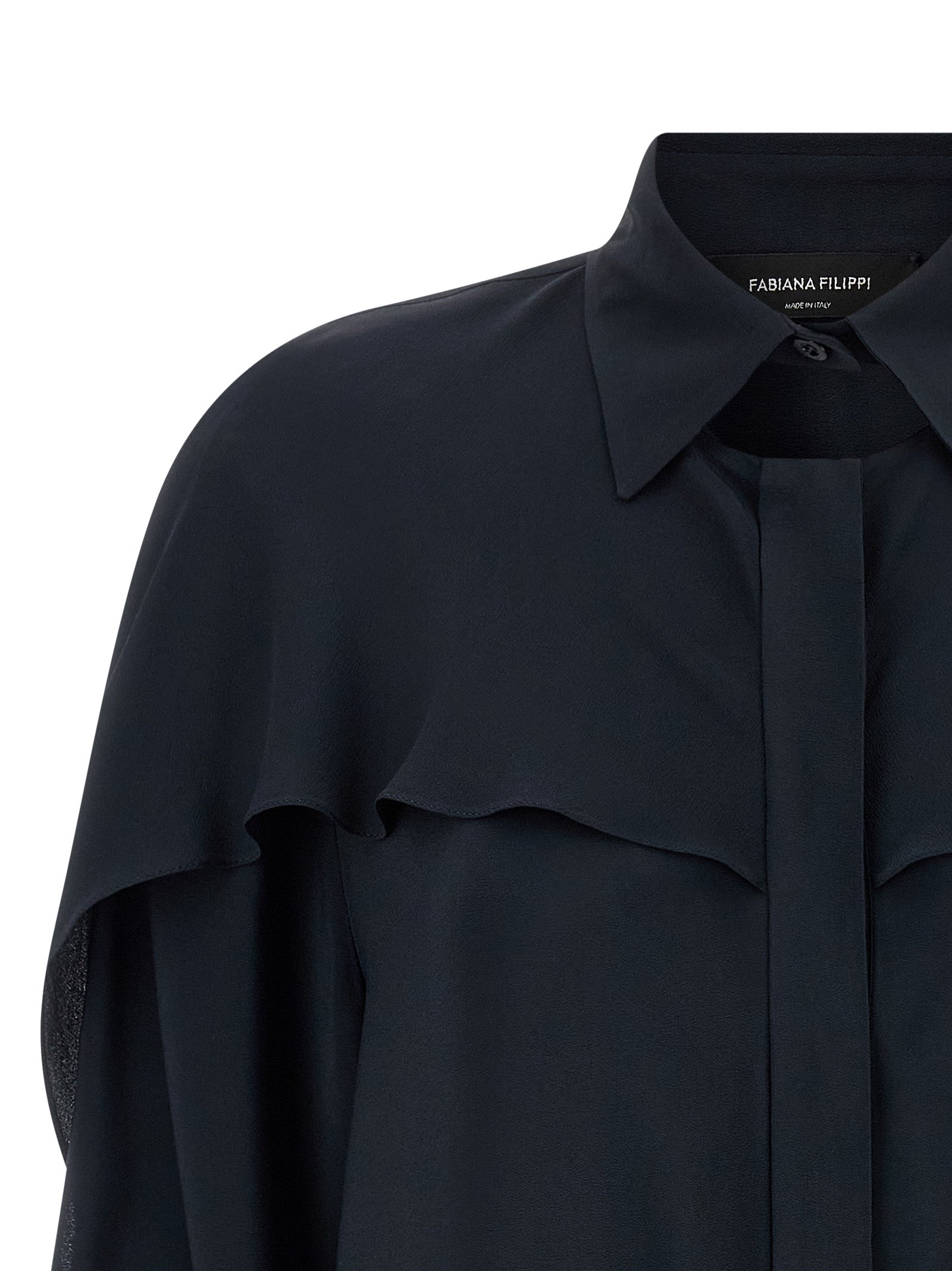 Experience the allure of Fabiana Filippi's Blue Acetate Blouse, a luxurious blend of silk and acetate, adorned with exquisite cut-out details that redefine elegance.