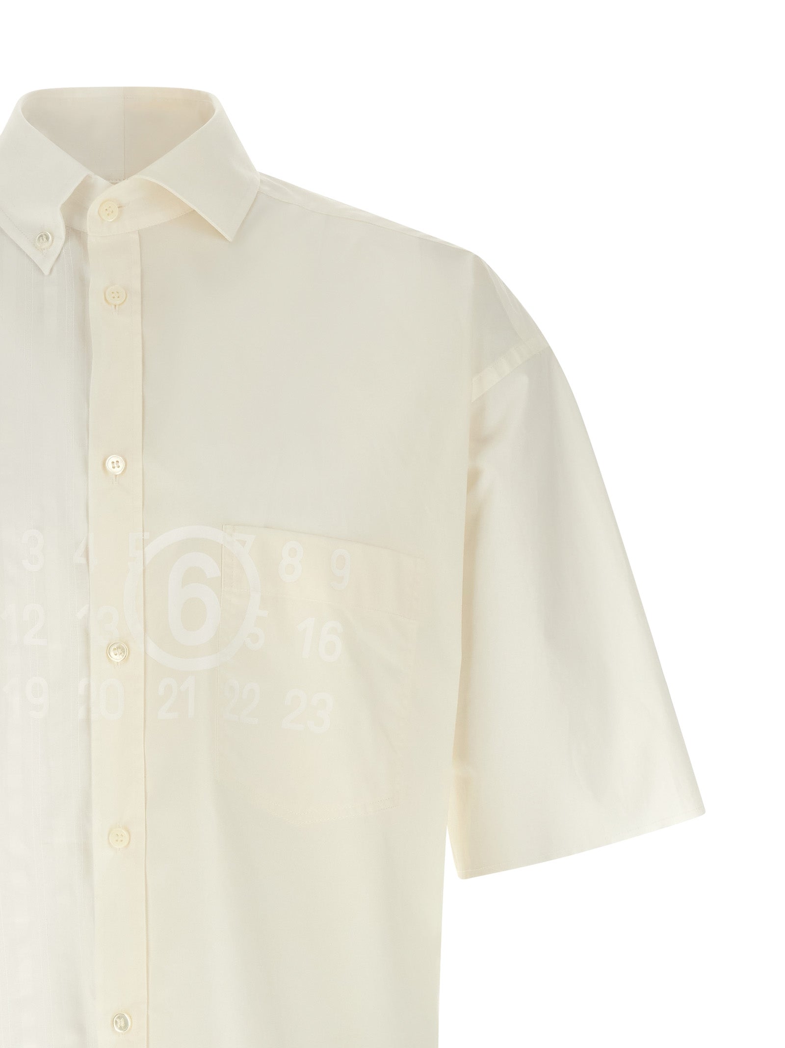 Discover the MM6 Maison Margiela White Cotton Blouse, a masterpiece of Italian craftsmanship that embodies modern elegance and avant-garde allure for the discerning individual.