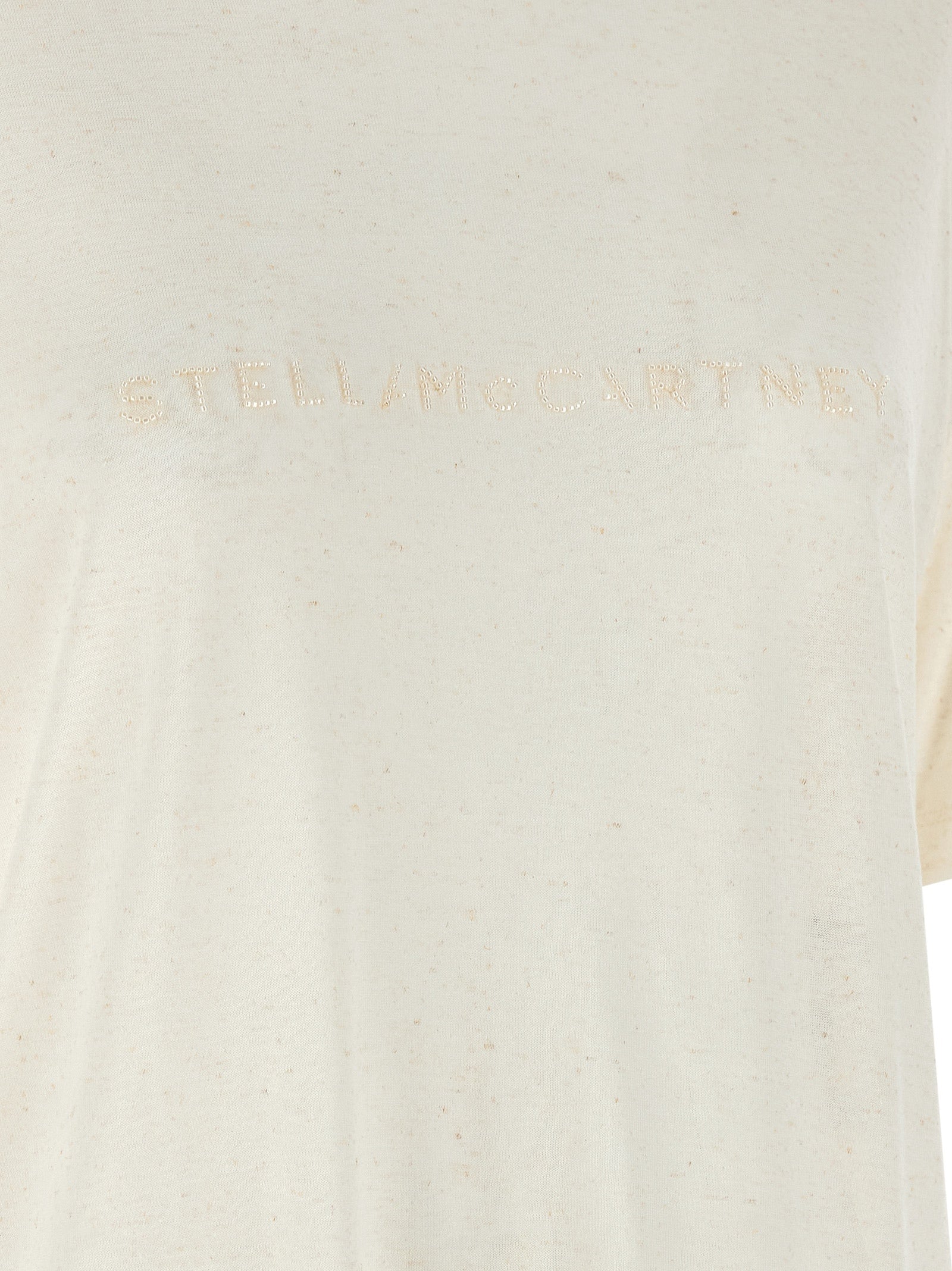 Elevate your wardrobe with the Stella McCartney White Viscose T-Shirt, a luxurious blend of viscose and linen, embodying effortless sophistication and timeless elegance.