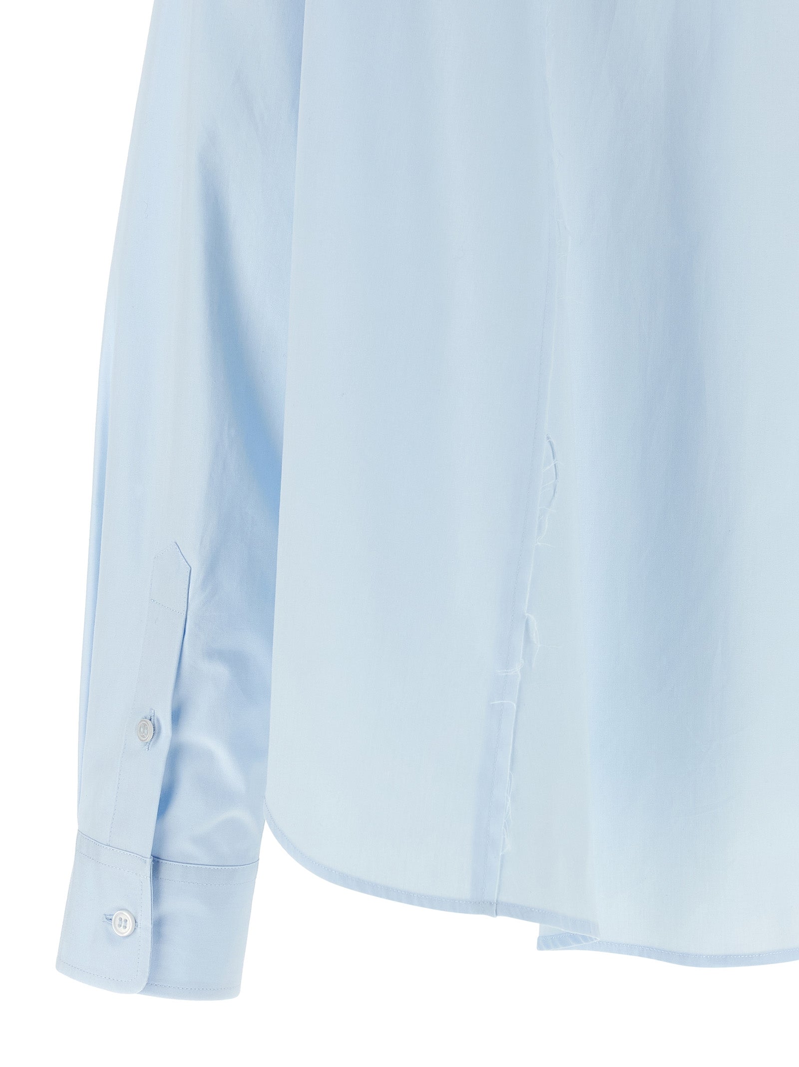 Experience the artisanal elegance of MM6 Maison Margiela's Blue Cotton Blouse, crafted from premium cotton poplin, embodying sophistication and modern allure.