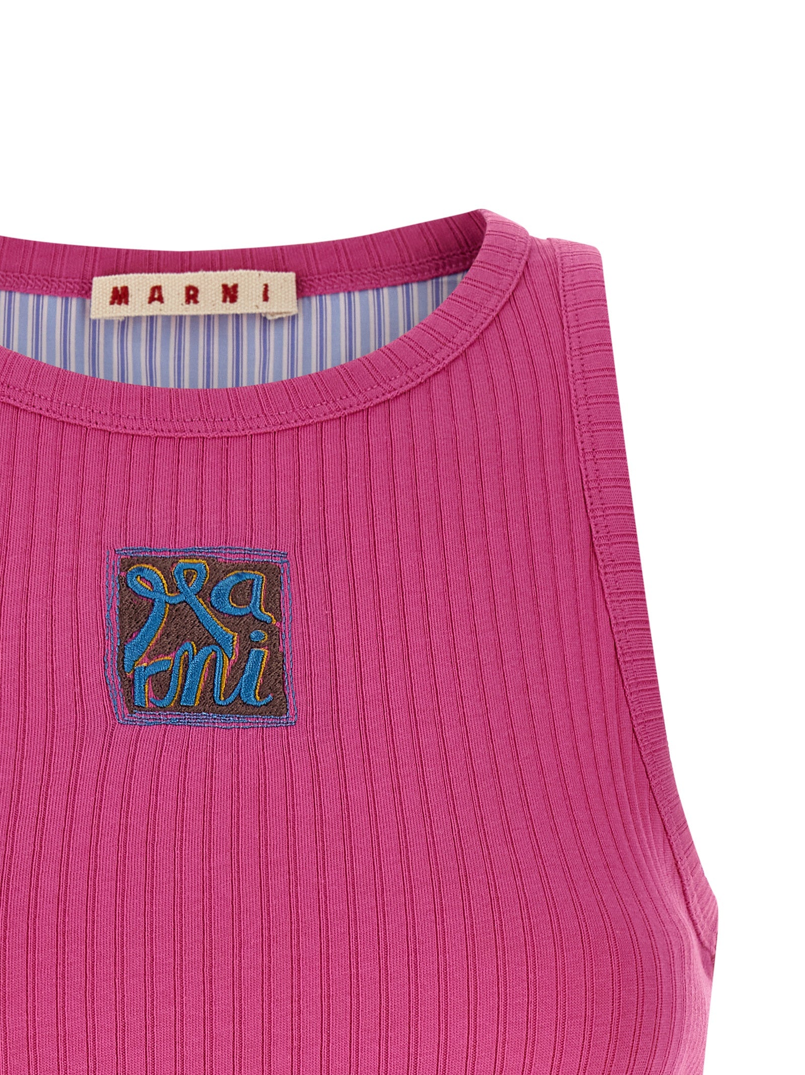 Elevate your style with the Marni Fuchsia Cotton Sleeveless T-Shirt, a luxurious statement piece crafted in Italy, embodying exquisite craftsmanship and vibrant elegance.