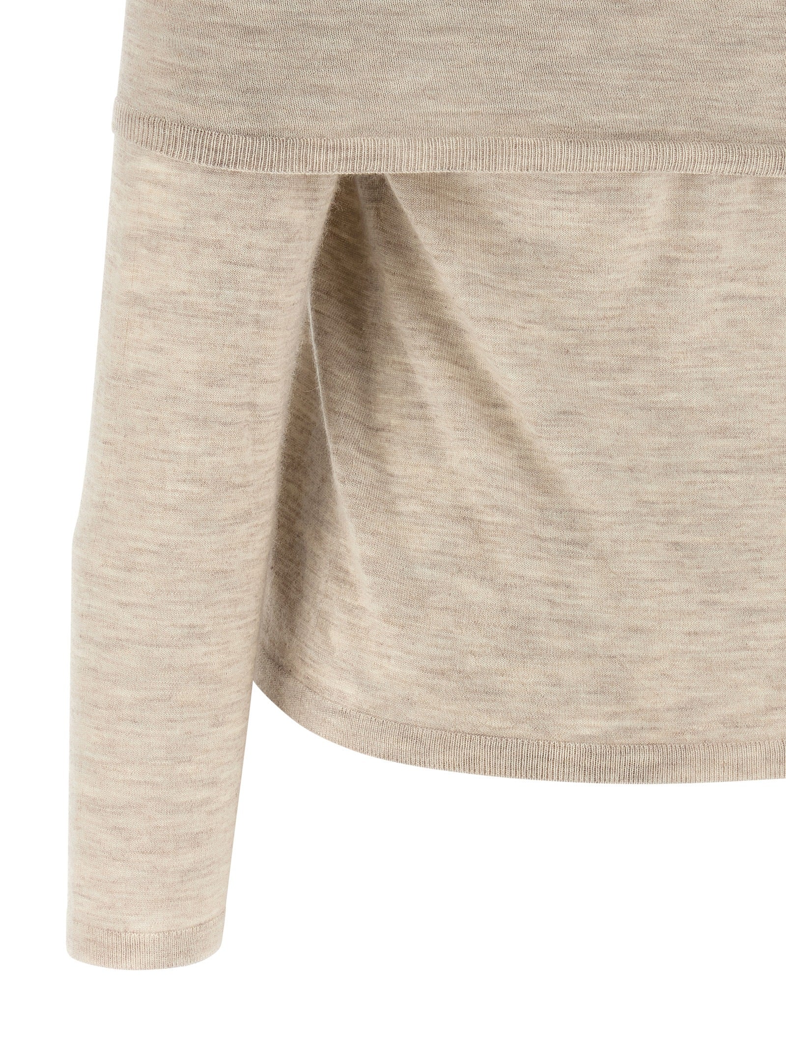 Experience the allure of the Max Mara Beige Cashmere Cardigan, a testament to artisanal luxury, crafted from the finest cashmere for timeless elegance and sophistication.
