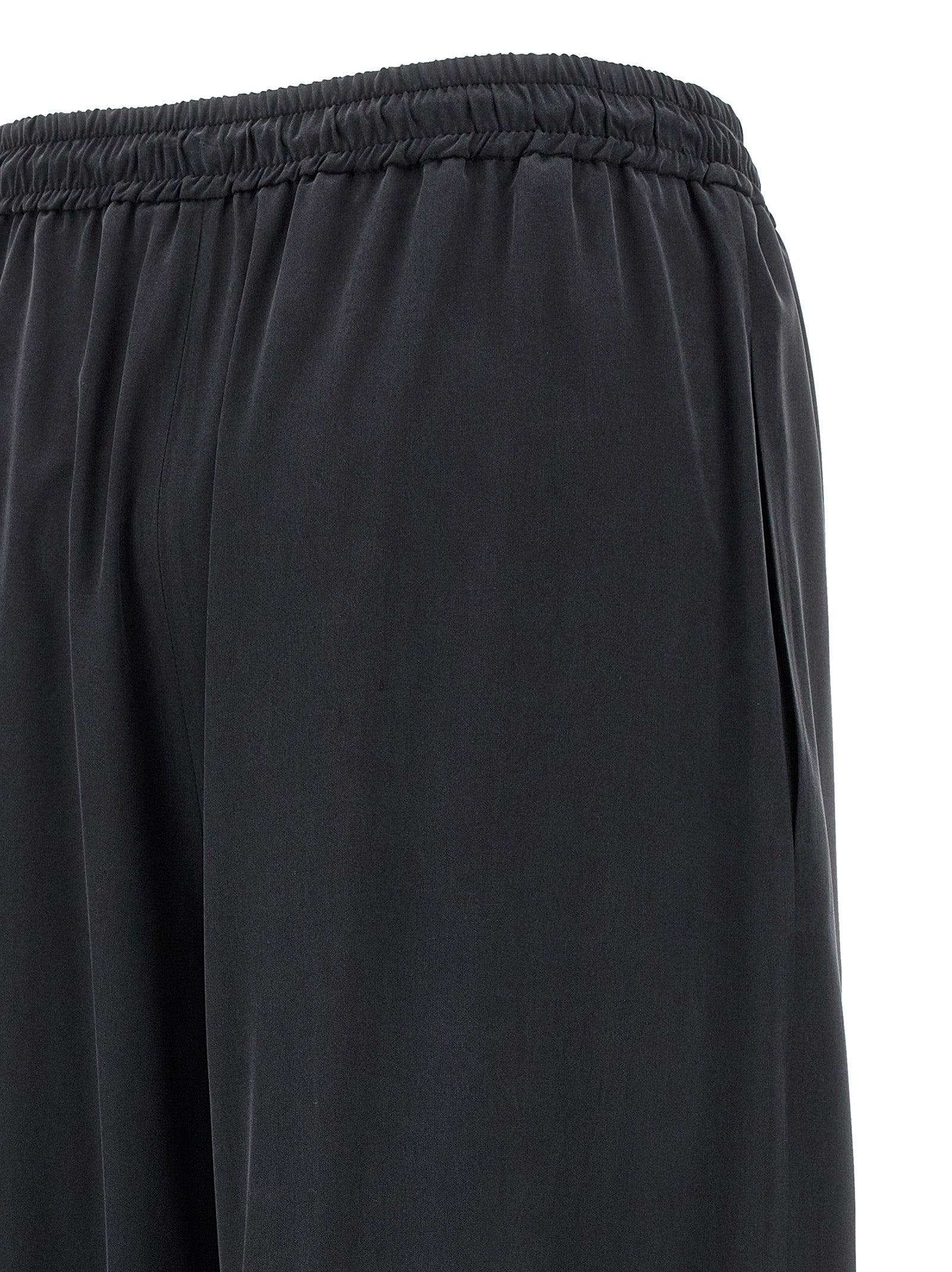 Indulge in the elegance of Max Mara Blue Silk Casual Pants, crafted from luxurious silk in Italy, embodying sophistication and versatility for the discerning wardrobe.