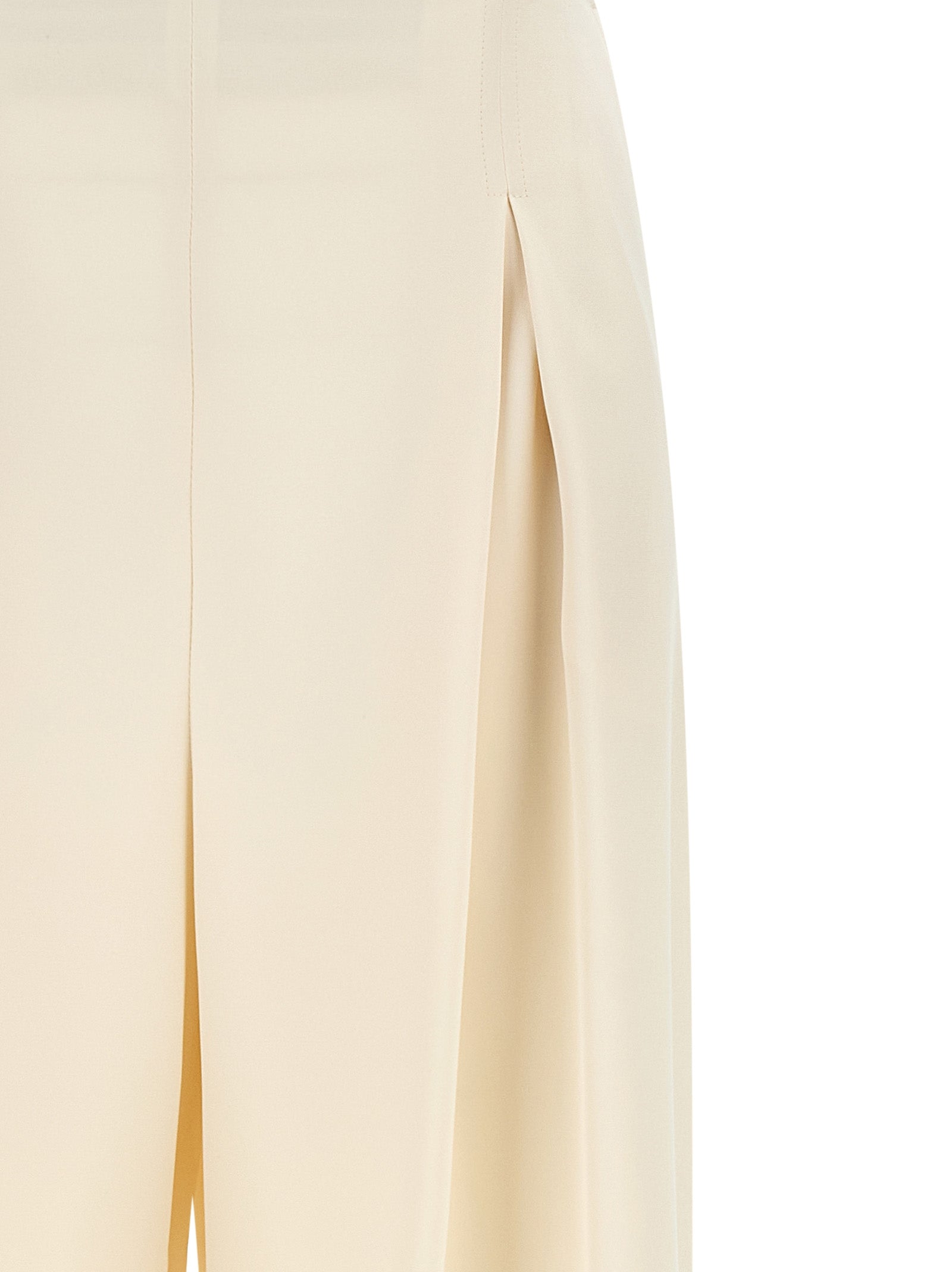 Elevate your wardrobe with Max Mara's Mxppalude White Silk Casual Pants, where artisanal craftsmanship meets luxurious comfort for timeless sophistication.