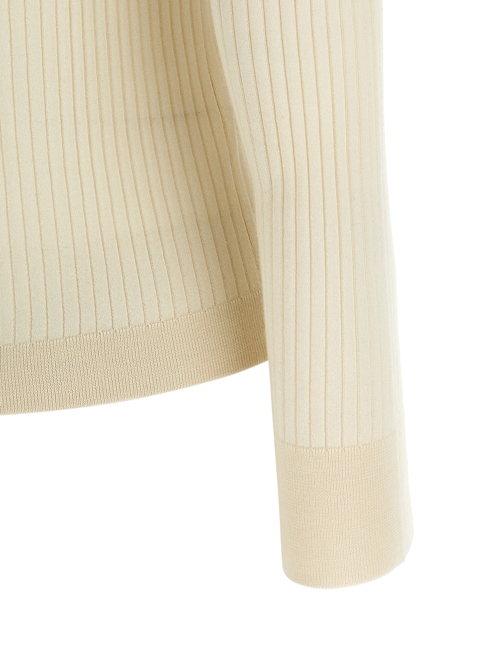 Discover the Max Mara White Cashmere Polo Shirt, a luxurious blend of cashmere and silk, embodying timeless elegance and sophisticated allure for the discerning individual.