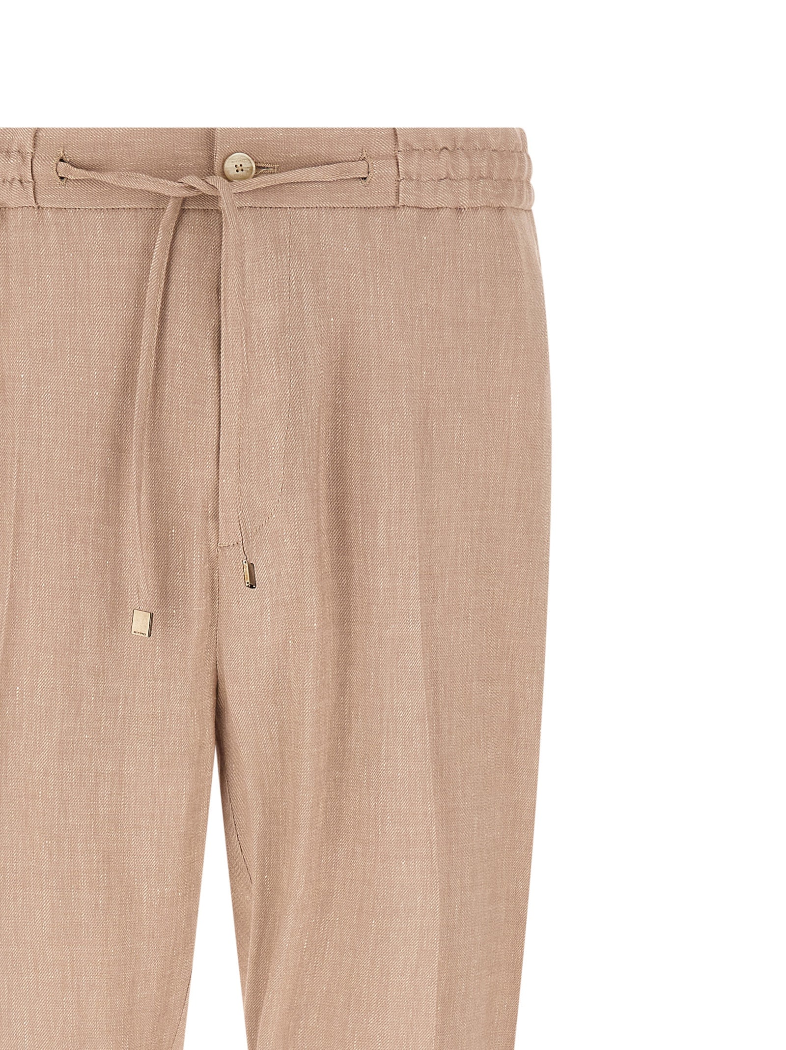 Elevate your style with Etro Beige Linen Joggers, crafted in Italy from a luxurious linen blend, embodying sophistication and effortless elegance for the discerning trendsetter.