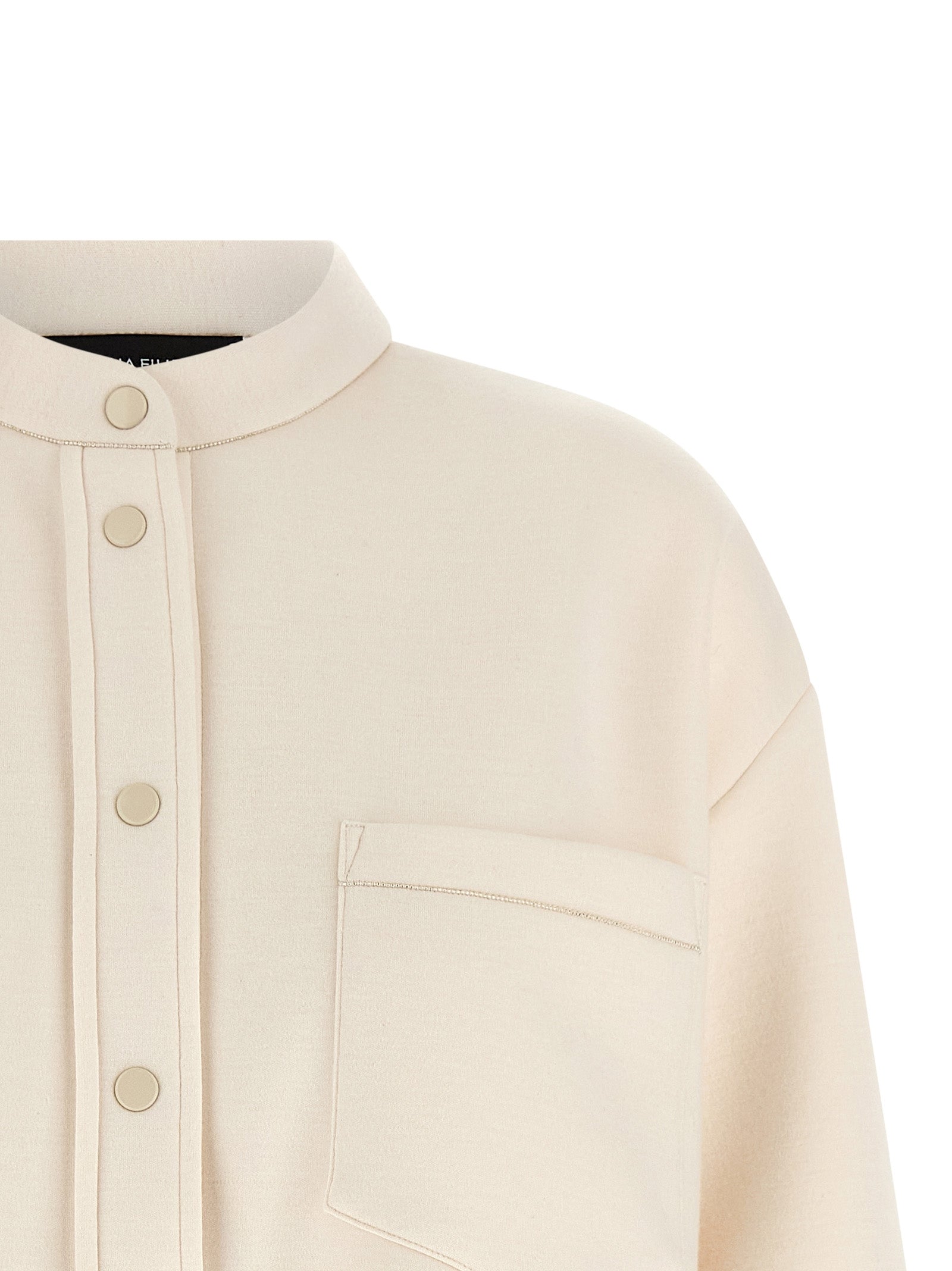 Discover the Fabiana Filippi Beige Modal Blouse, a luxurious blend of modal and cashmere, embodying exquisite craftsmanship and timeless elegance for the discerning connoisseur.
