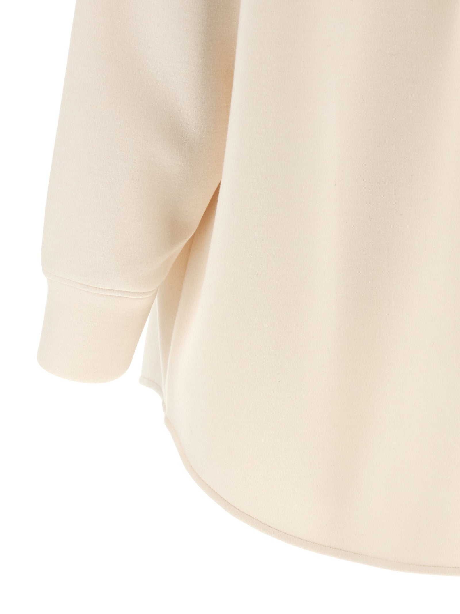 Elevate your wardrobe with the Fabiana Filippi Beige Modal Blouse, a luxurious blend of modal and cashmere, embodying exquisite craftsmanship and timeless elegance.
