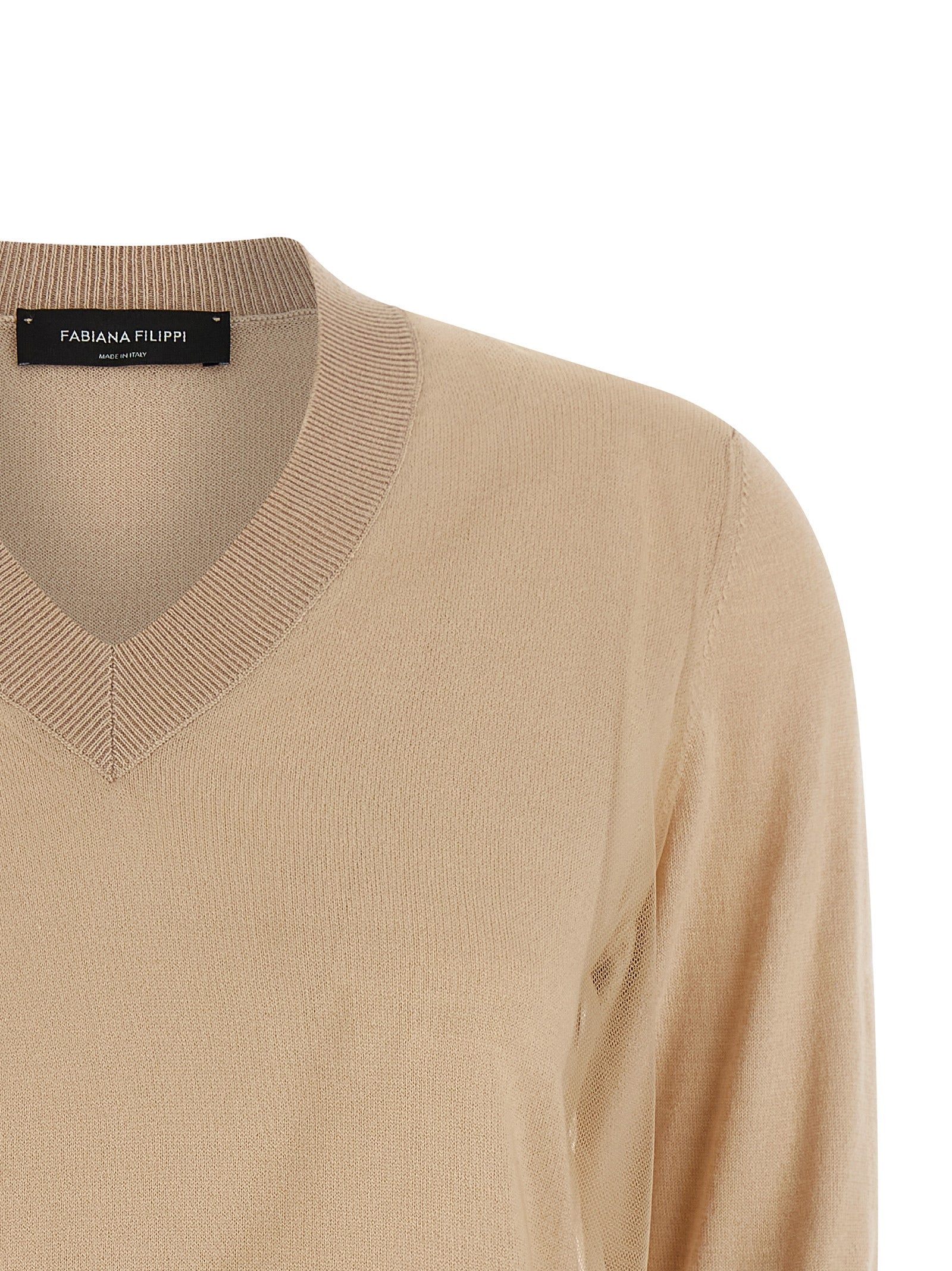 Indulge in the Fabiana Filippi Beige Virgin Wool Cardigan, a luxurious blend of virgin wool and cotton, designed for timeless elegance and effortless sophistication.