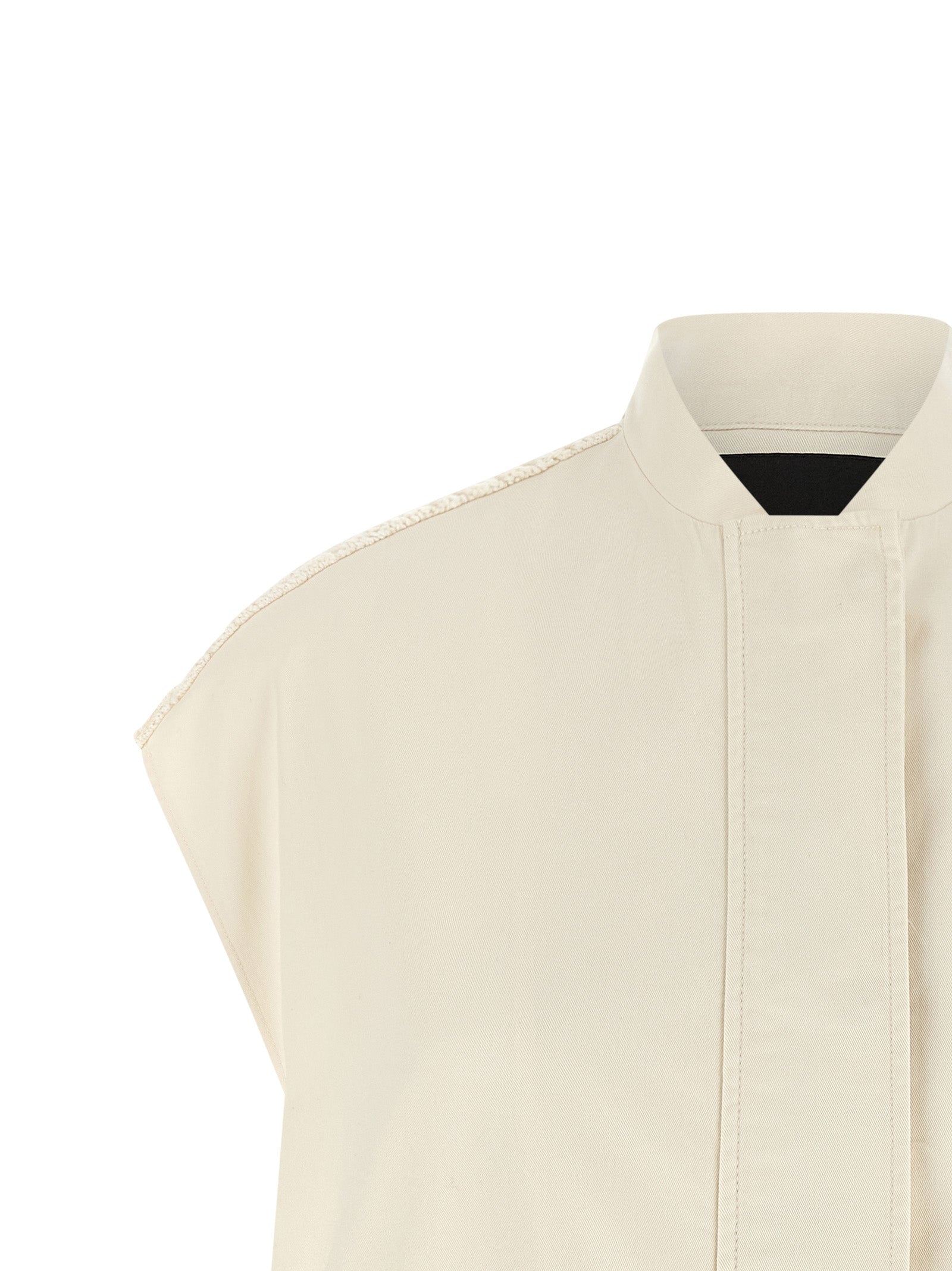 Elevate your style with the Fabiana Filippi Beige Cotton Sleeveless Jacket, a luxurious blend of cotton and elastane, embodying timeless elegance and sophisticated allure.