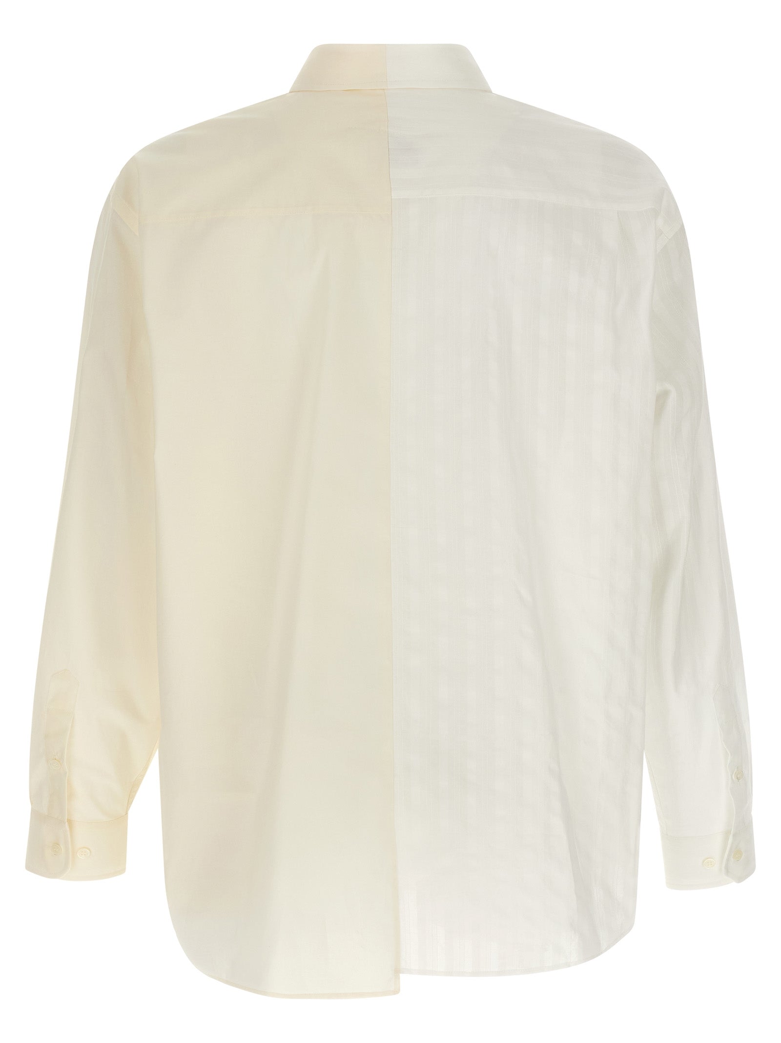 Elevate your style with the MM6 Maison Margiela Multicolor Cotton Blouse, a masterful blend of avant-garde design and luxurious comfort, crafted for the discerning individual.