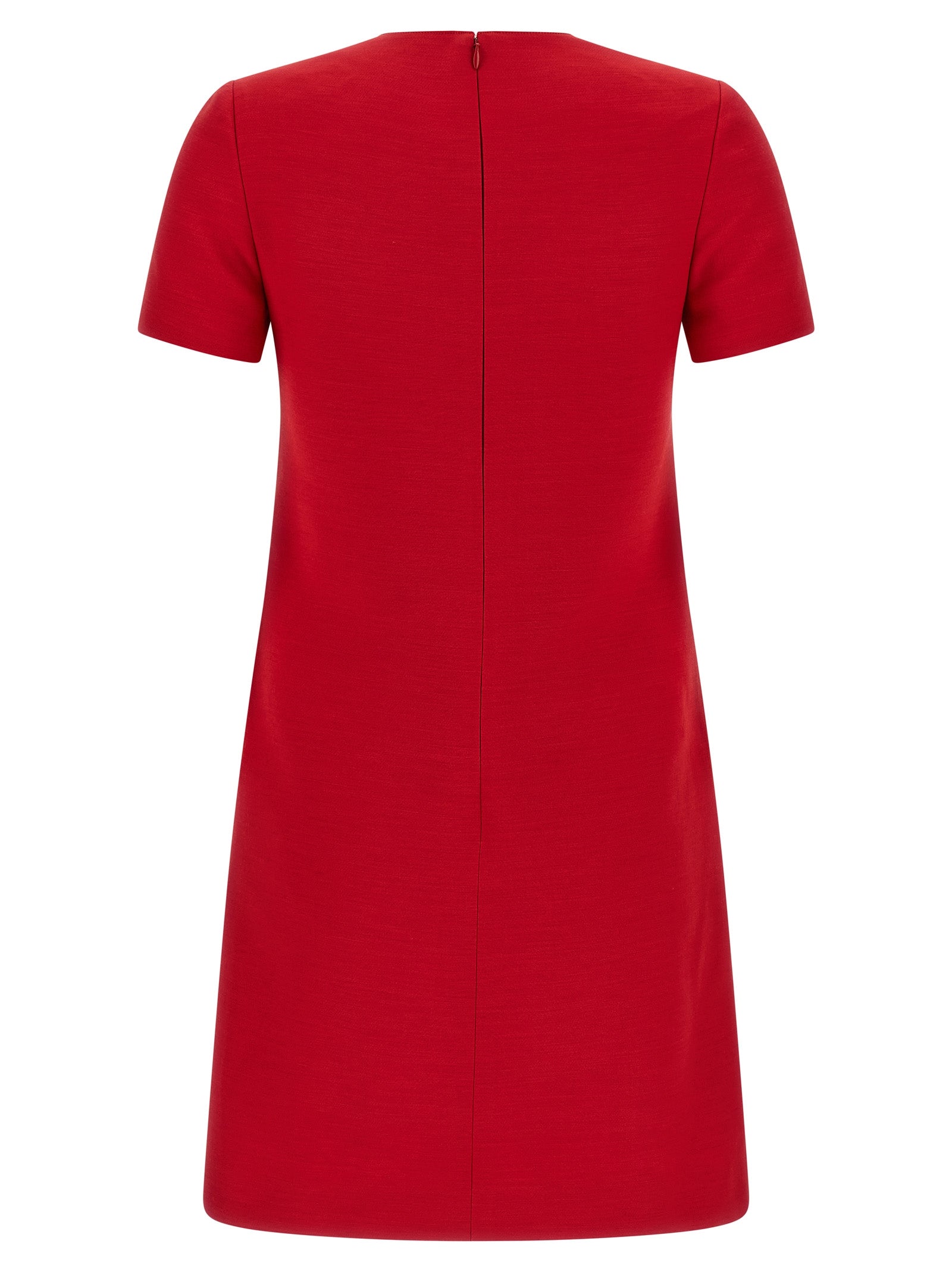 Indulge in the exquisite allure of the Valentino Garavani Crêpe Couture mini dress, crafted from luxurious virgin wool and silk, embodying timeless elegance for the discerning individual.