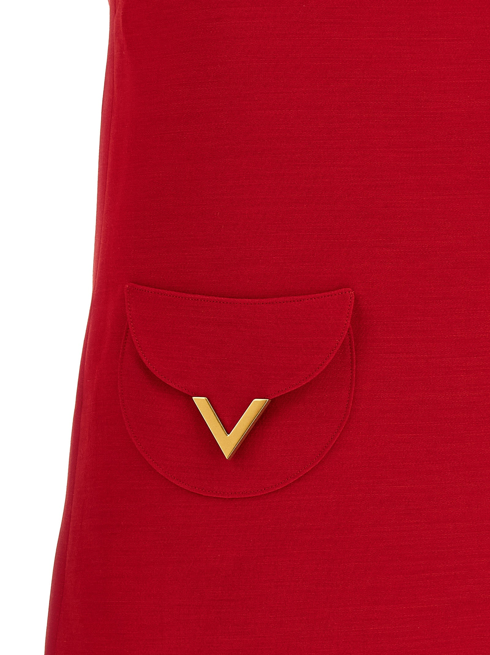 Indulge in the VALENTINO GARAVANI Crêpe Couture mini dress, a luxurious blend of virgin wool and silk, embodying timeless elegance and sophisticated allure.