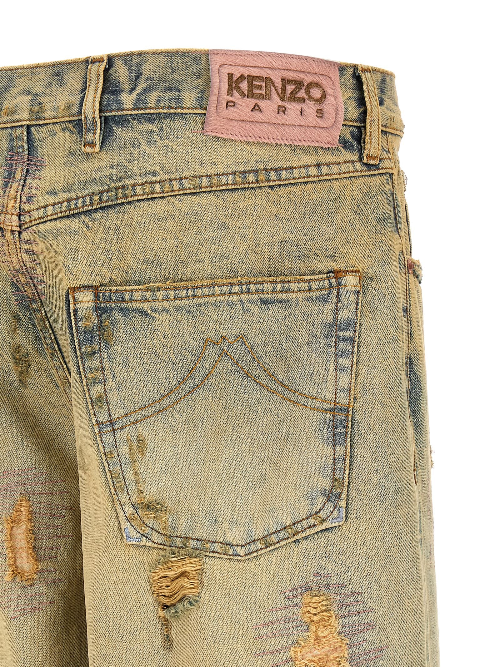 Indulge in the artistry of Kenzo Bicolor Cotton Straight-Leg Jeans, where premium Japanese denim meets daring design, perfect for the discerning individual seeking bold expression.