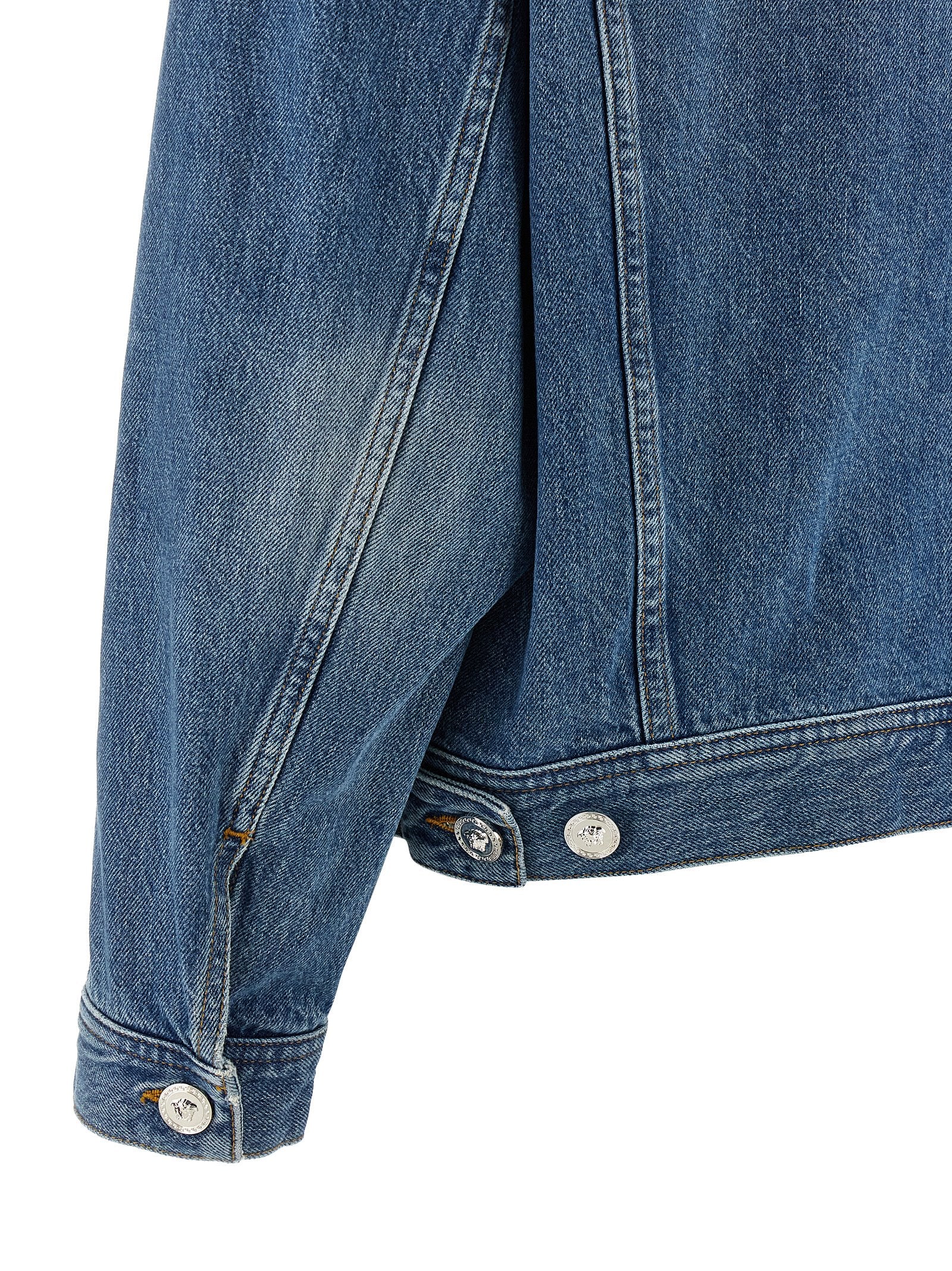 Indulge in the Versace Blue Cotton Denim Jacket, a masterpiece of Italian craftsmanship, blending luxury and comfort for the discerning fashionista.