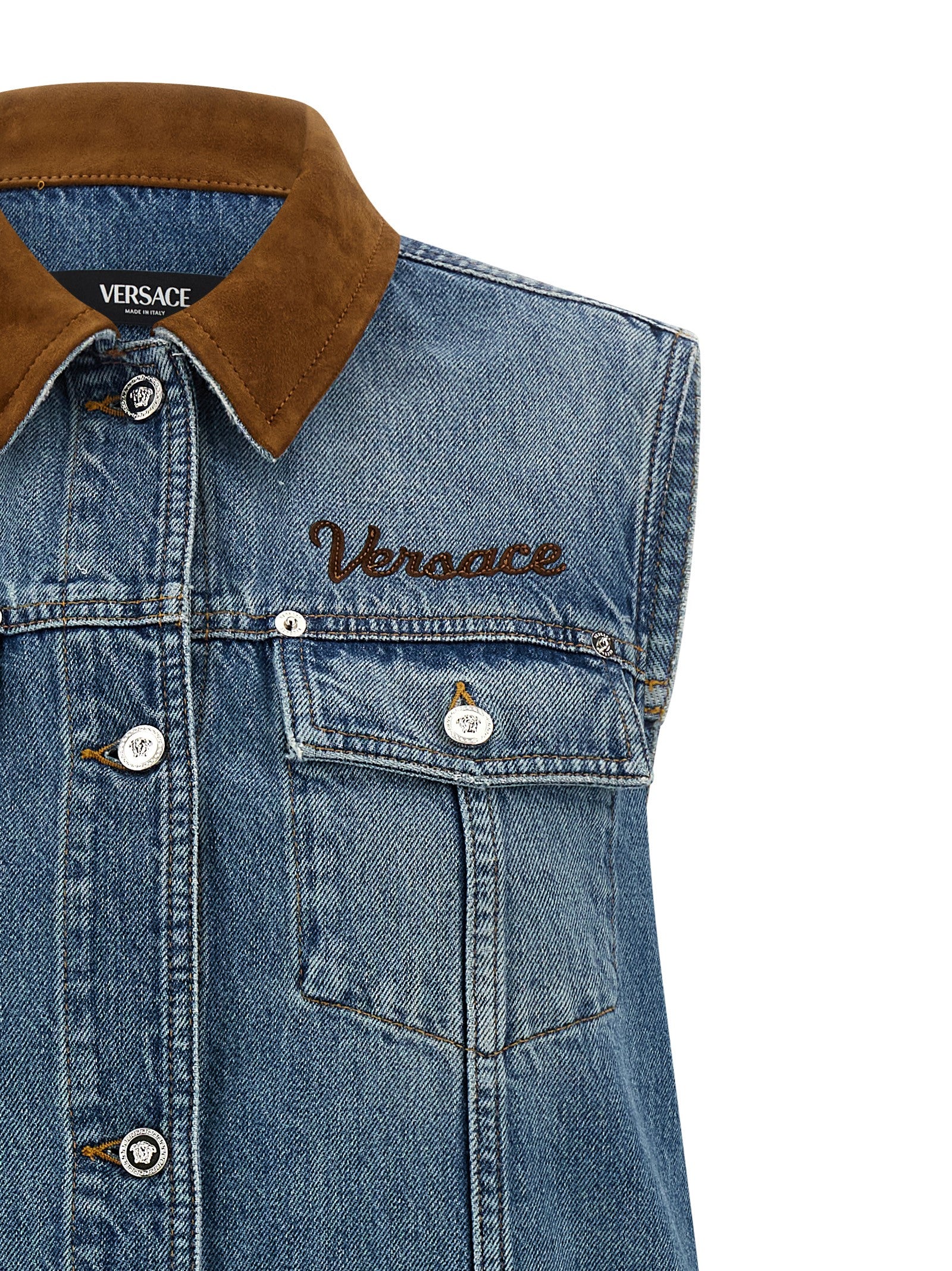 Elevate your wardrobe with the Versace Blue Cotton Short Dress, a luxurious blend of 100% cotton denim, embodying timeless elegance and modern sophistication.