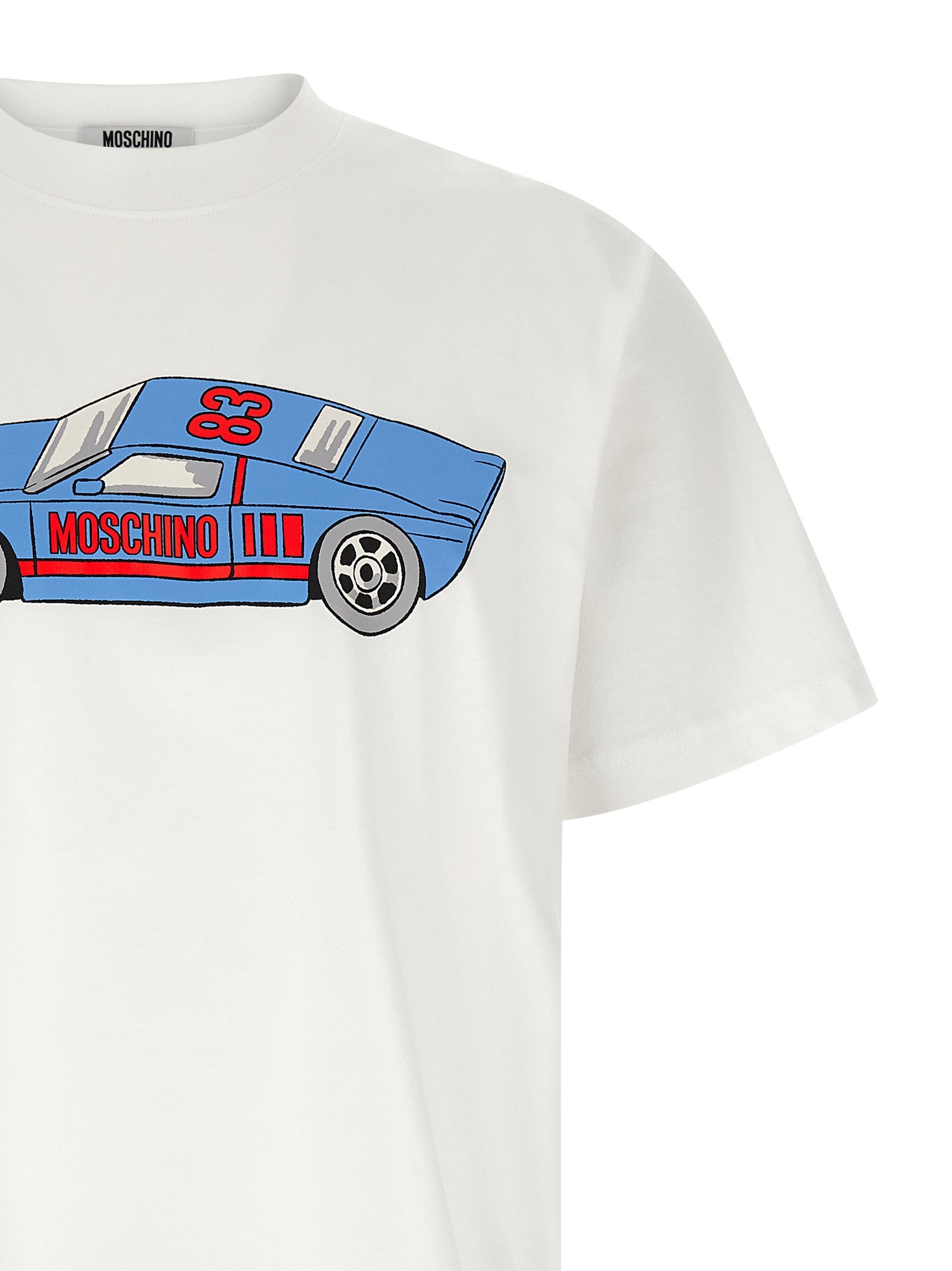 Elevate your wardrobe with the Moschino White Cotton T-Shirt, a luxurious blend of comfort and style, featuring a striking graphic that embodies sophistication and allure.
