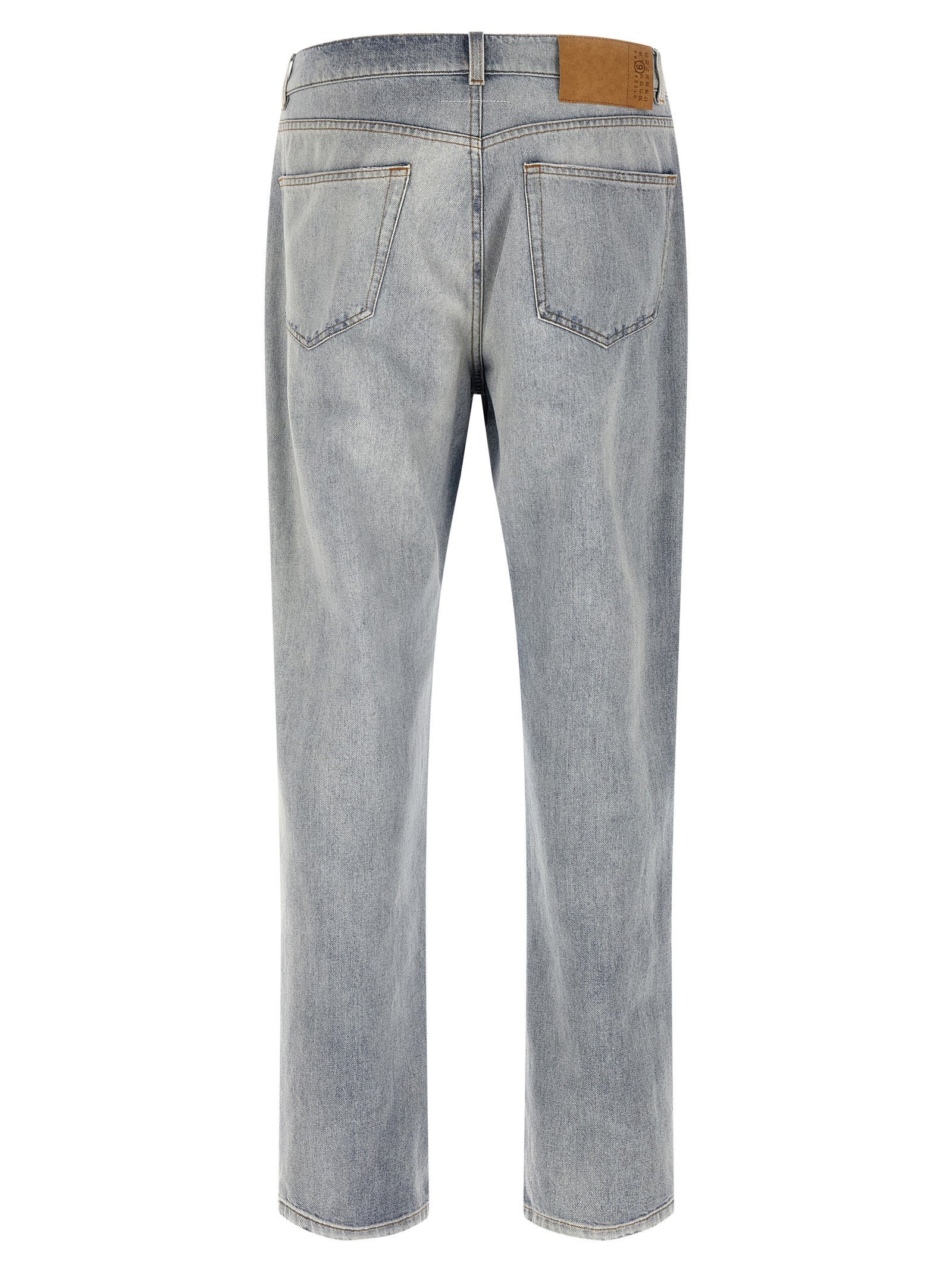 Elevate your style with MM6 Maison Margiela's Blue Cotton Relaxed Fit Jeans, where artisanal Italian craftsmanship meets bold design for an effortlessly chic statement.