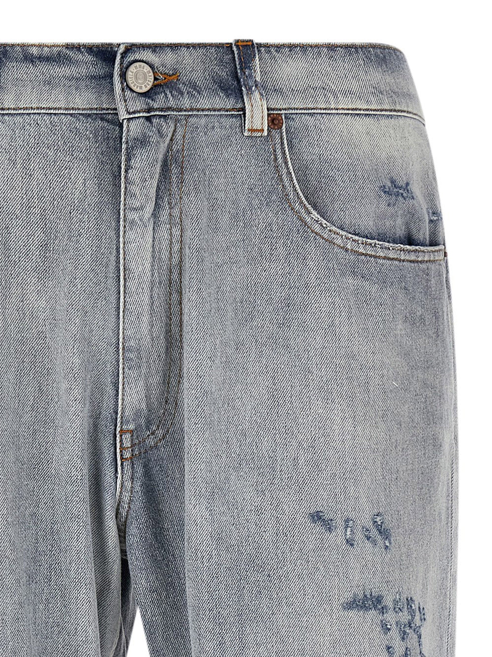 Elevate your wardrobe with MM6 Maison Margiela's Blue Cotton Relaxed Fit Jeans, a luxurious blend of artisanal craftsmanship and bold design, perfect for discerning tastes.