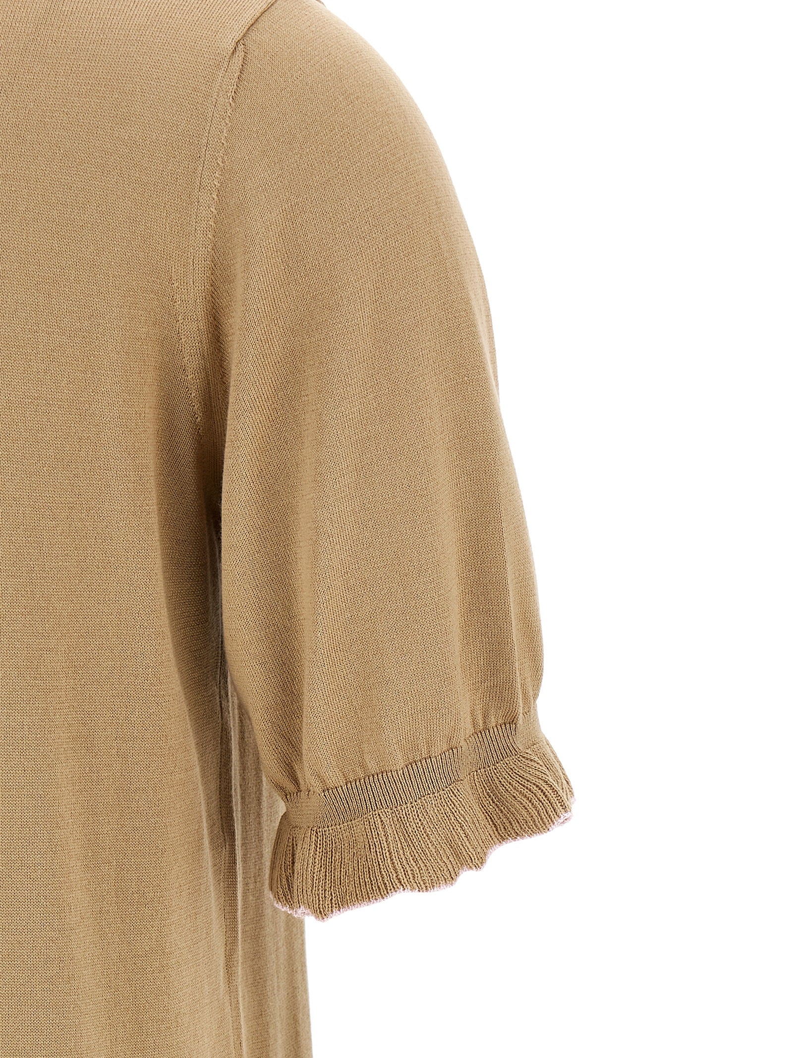 Indulge in the exquisite Fabiana Filippi Beige Silk Polo Shirt, a harmonious blend of silk and cotton that embodies timeless elegance and artisanal craftsmanship.