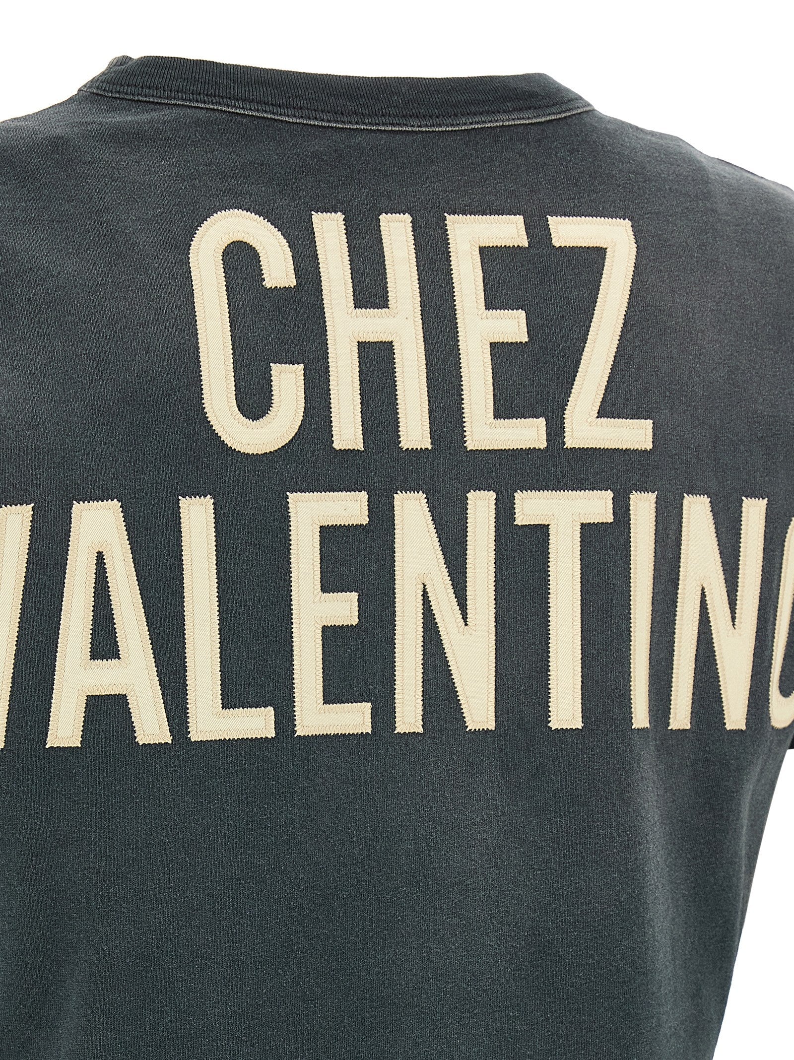 Elevate your wardrobe with the VALENTINO GARAVANI Gray Cotton T-Shirt, featuring a striking ‘Panther Lady’ print that embodies timeless luxury and sophistication.