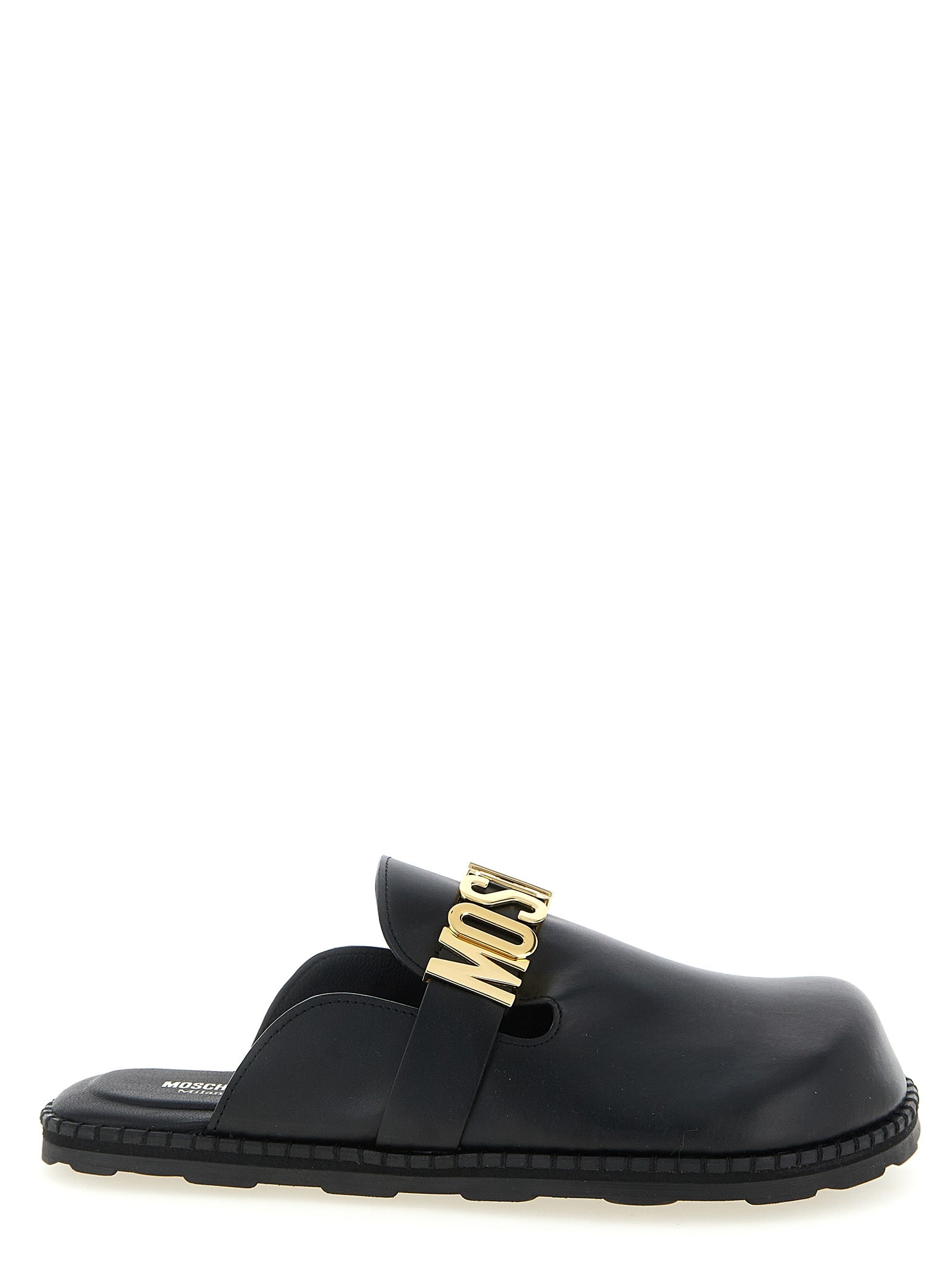 Elevate your style with Moschino Black Calfskin Clogs, where exquisite craftsmanship meets bold design, embodying luxury and sophistication for every occasion.