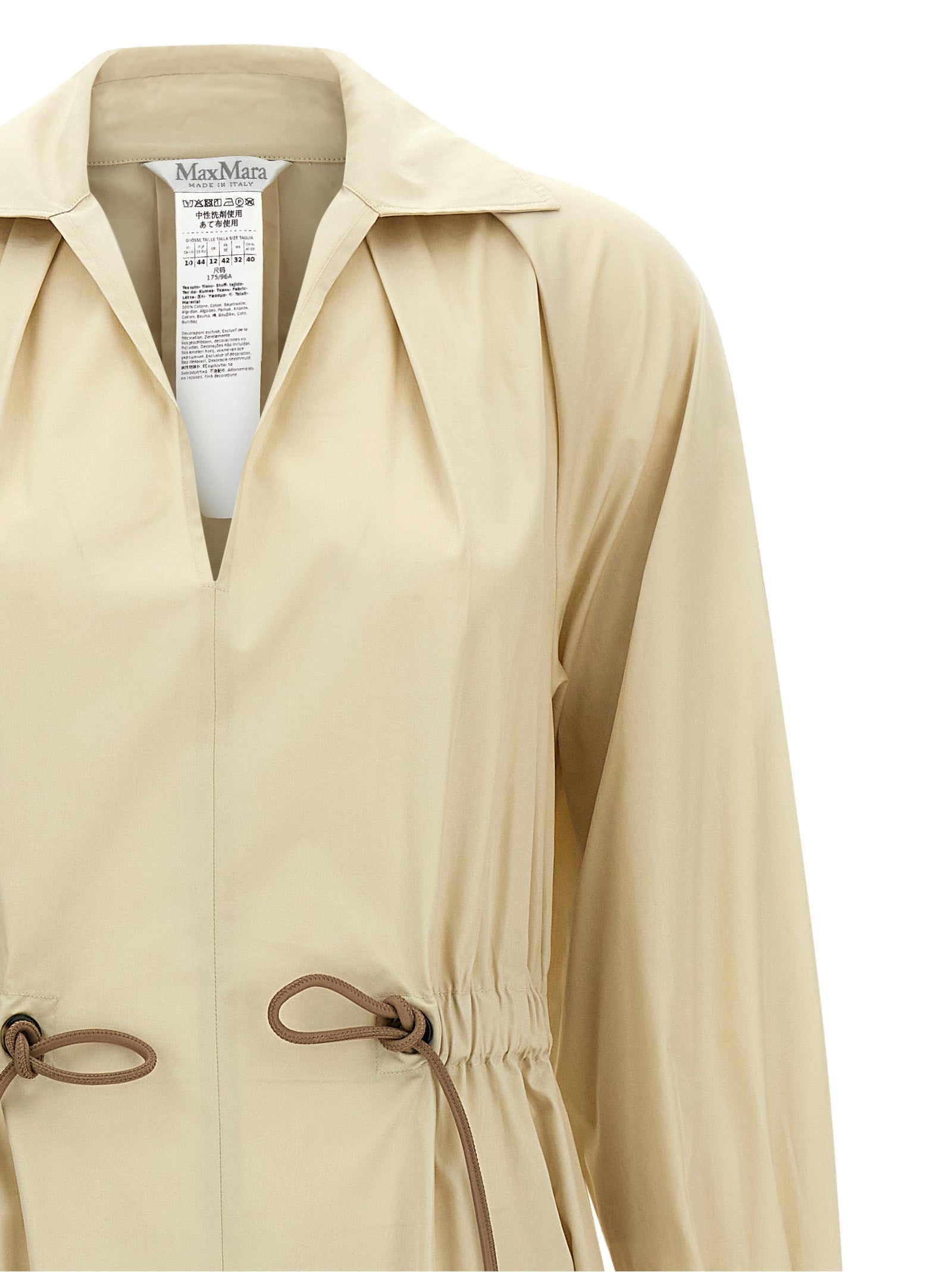 Discover the Max Mara Beige Cotton Long Dress, a luxurious blend of Italian craftsmanship and modern elegance, perfect for any sophisticated occasion.