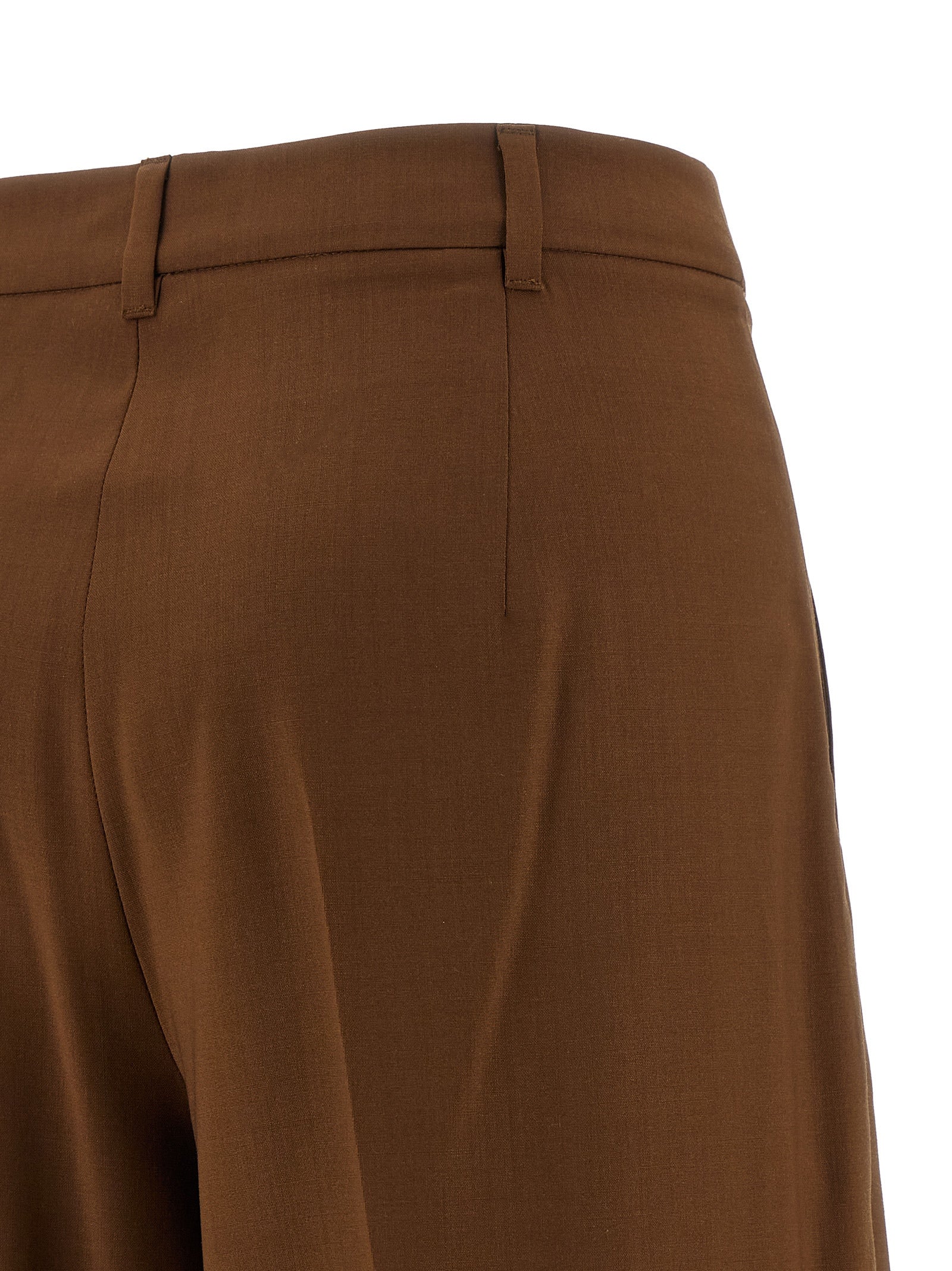 Experience the artisanal elegance of Max Mara's Brown Virgin Wool Casual Pants, crafted for those who appreciate luxury and sophistication in every detail.