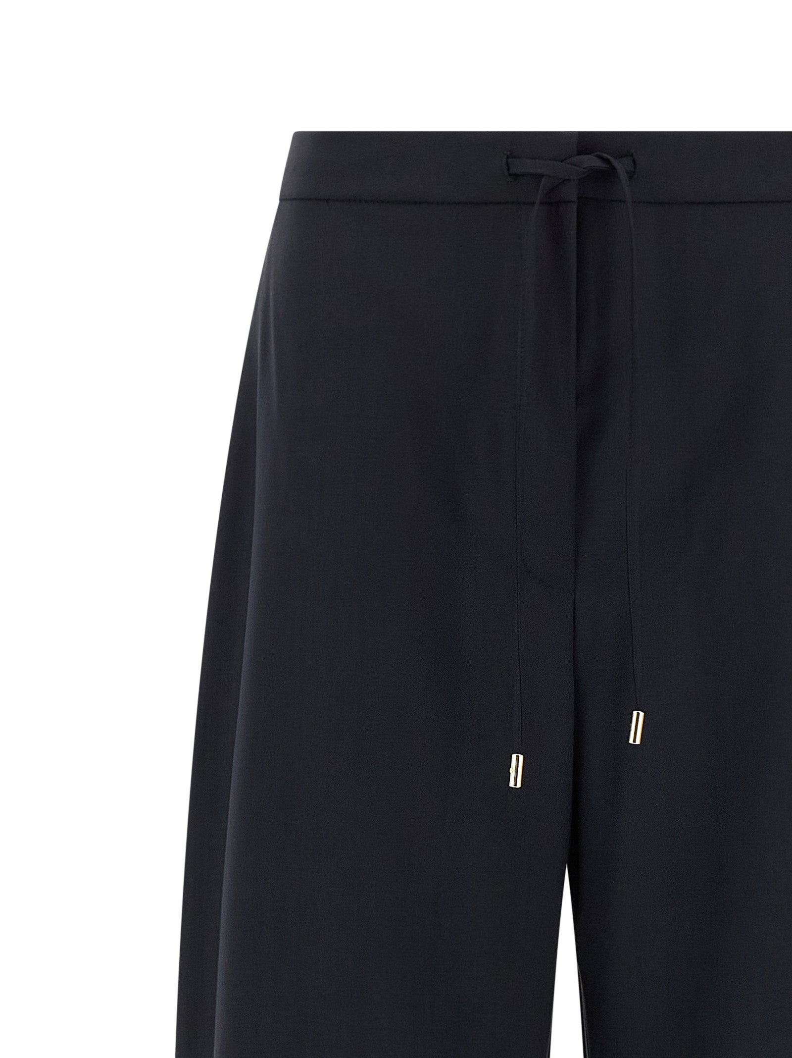 Indulge in the exquisite Max Mara Blue Virgin Wool Casual Pants, where timeless elegance meets luxurious craftsmanship, perfect for the discerning fashion connoisseur.