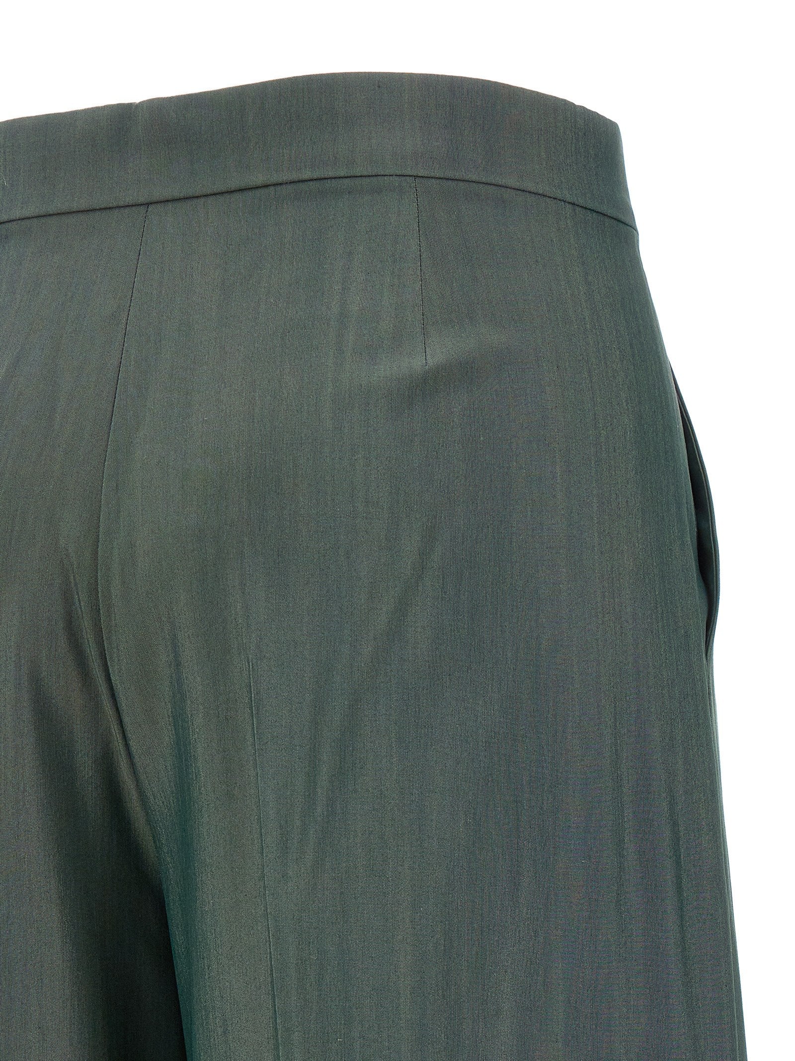 Experience the exquisite elegance of Max Mara Bicolor Virgin Wool Casual Pants, crafted from luxurious virgin wool and silk, perfect for the discerning fashion connoisseur.