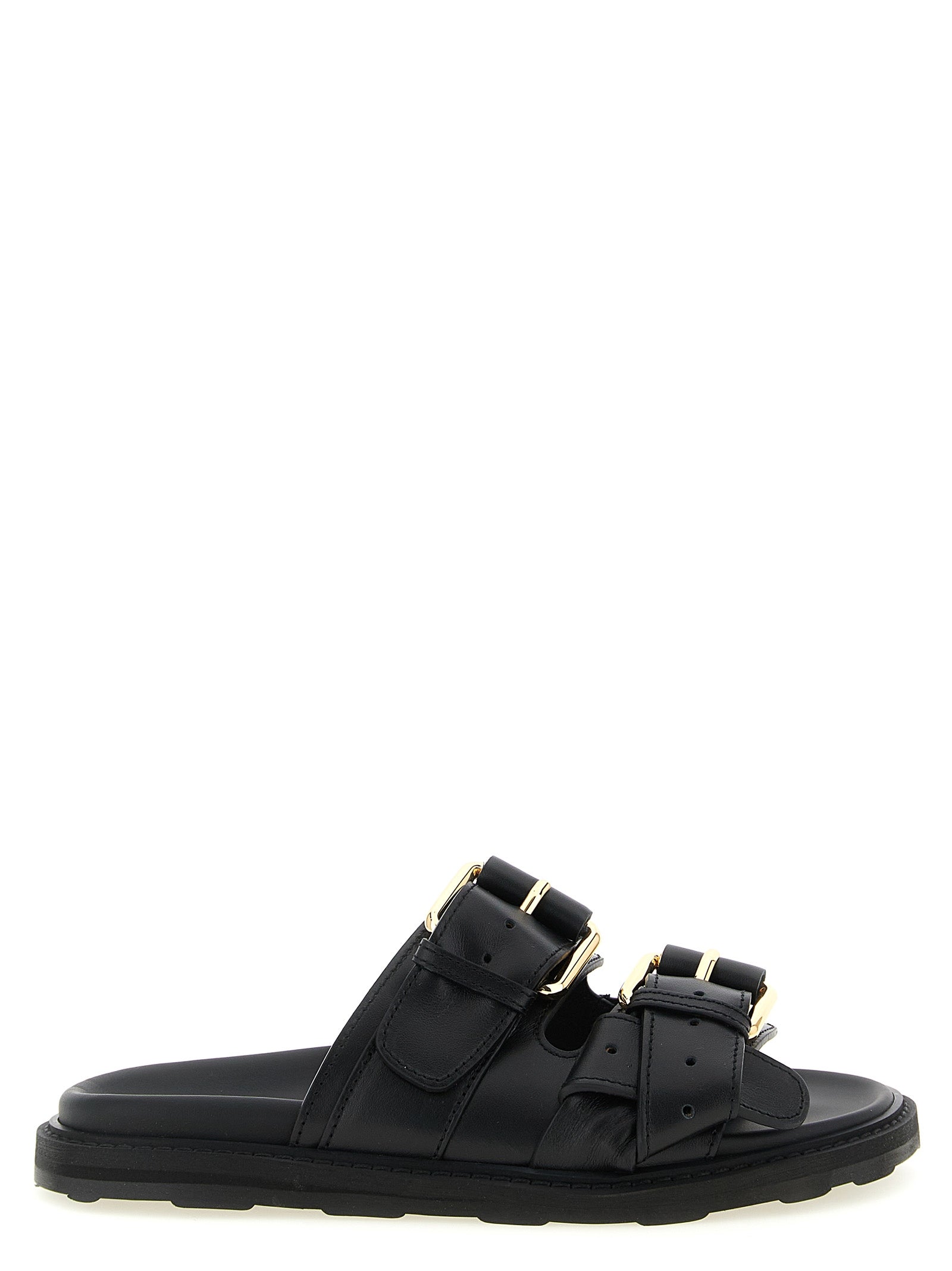 Indulge in the Moschino Black Calfskin Slides, a masterpiece of artisanal luxury crafted from sumptuous calfskin, perfect for elevating your sophisticated style.