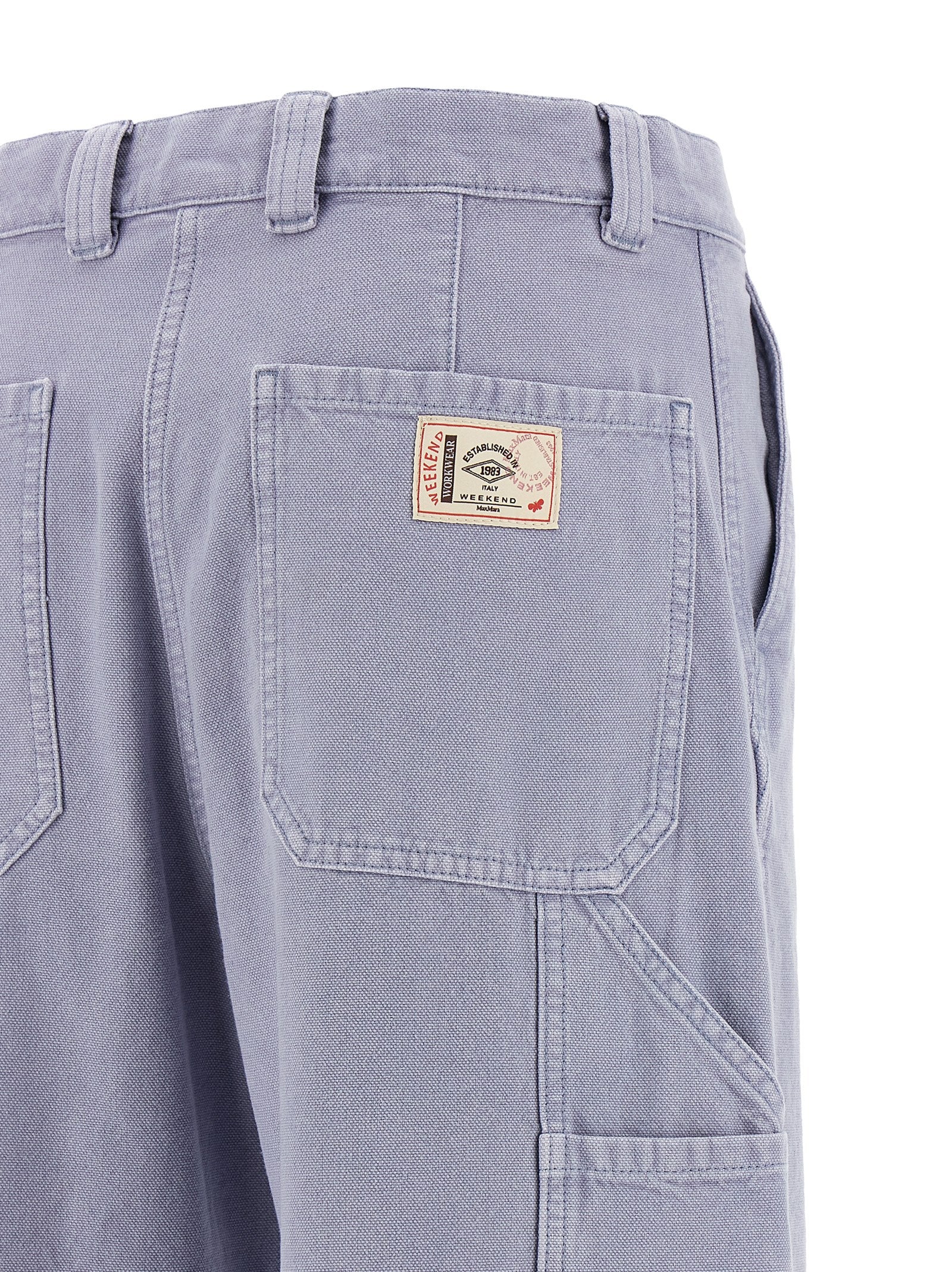 Elevate your wardrobe with WEEKEND MAX MARA's luxurious purple cotton trousers, where exquisite craftsmanship meets effortless elegance for the modern connoisseur.