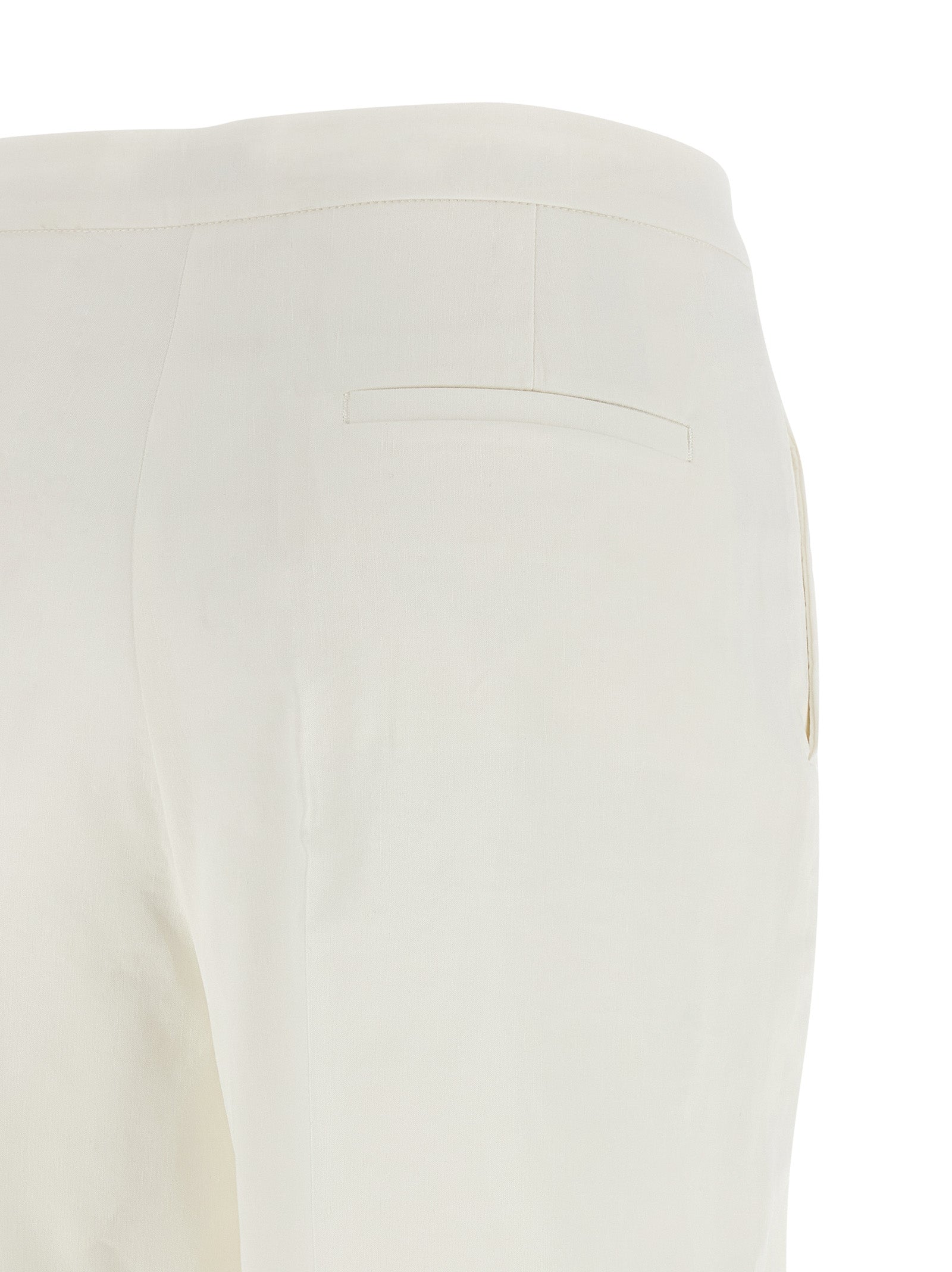 Discover the exquisite PINKO White Linen Casual Pants, a masterful blend of elegance and comfort, crafted in Italy for the discerning individual seeking effortless luxury.
