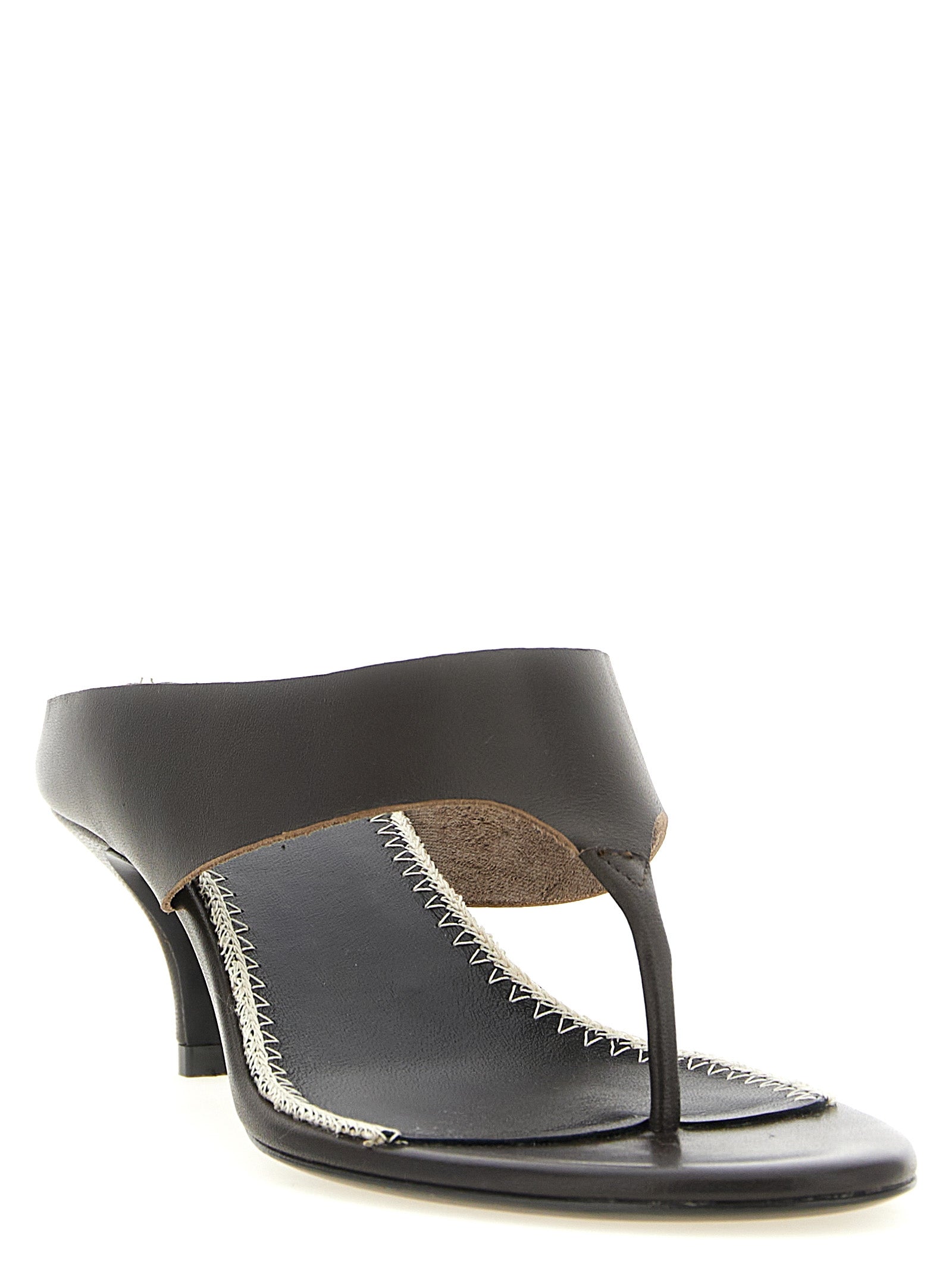 Indulge in the exquisite craftsmanship of Magda Butrym's brown leather stiletto heel sandals, where luxurious napa leather meets timeless elegance for unforgettable moments.