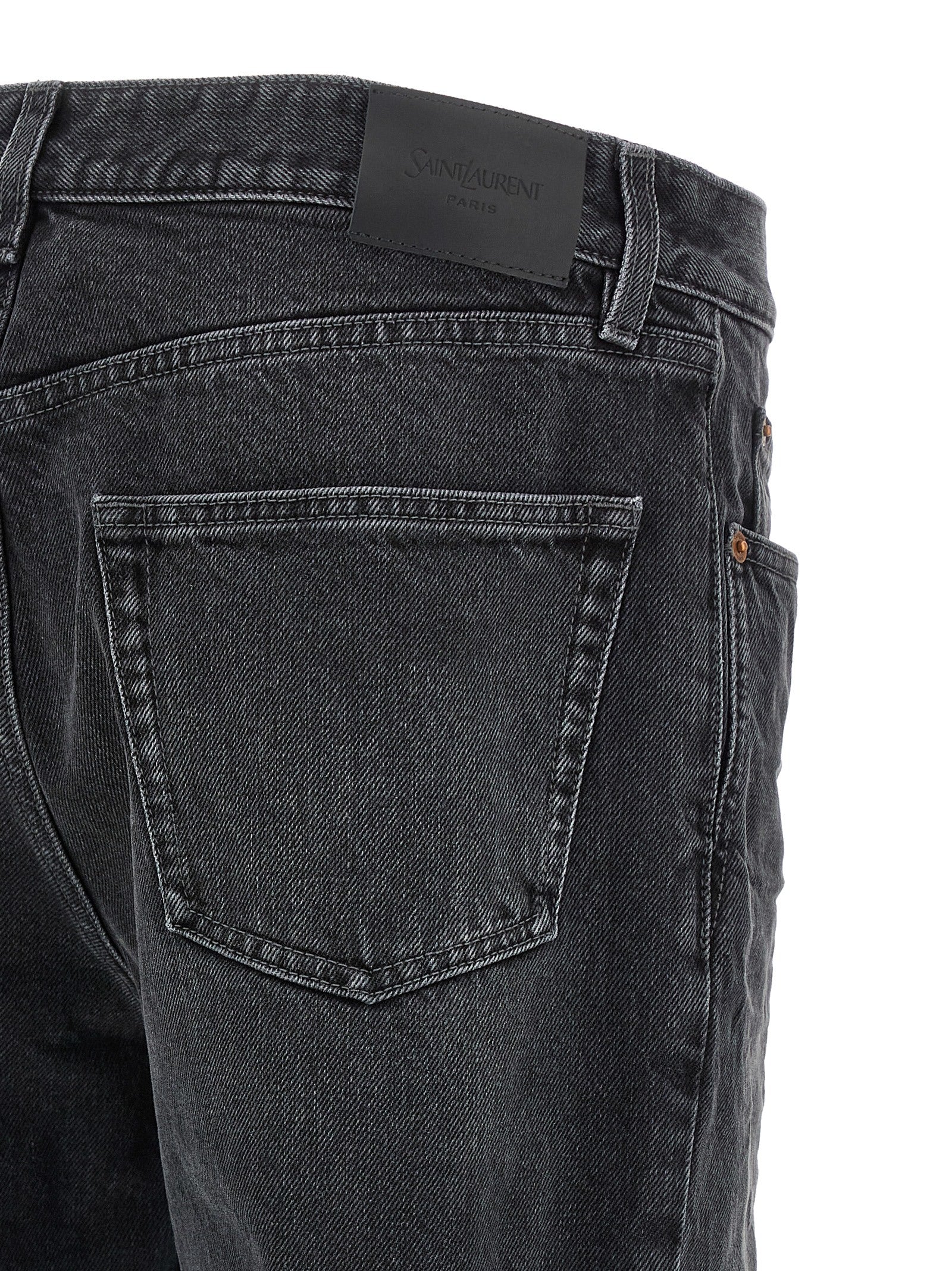 Elevate your wardrobe with Saint Laurent's Black Cotton Straight-Leg Jeans, a timeless blend of luxury and comfort, embodying exquisite craftsmanship for the discerning individual.