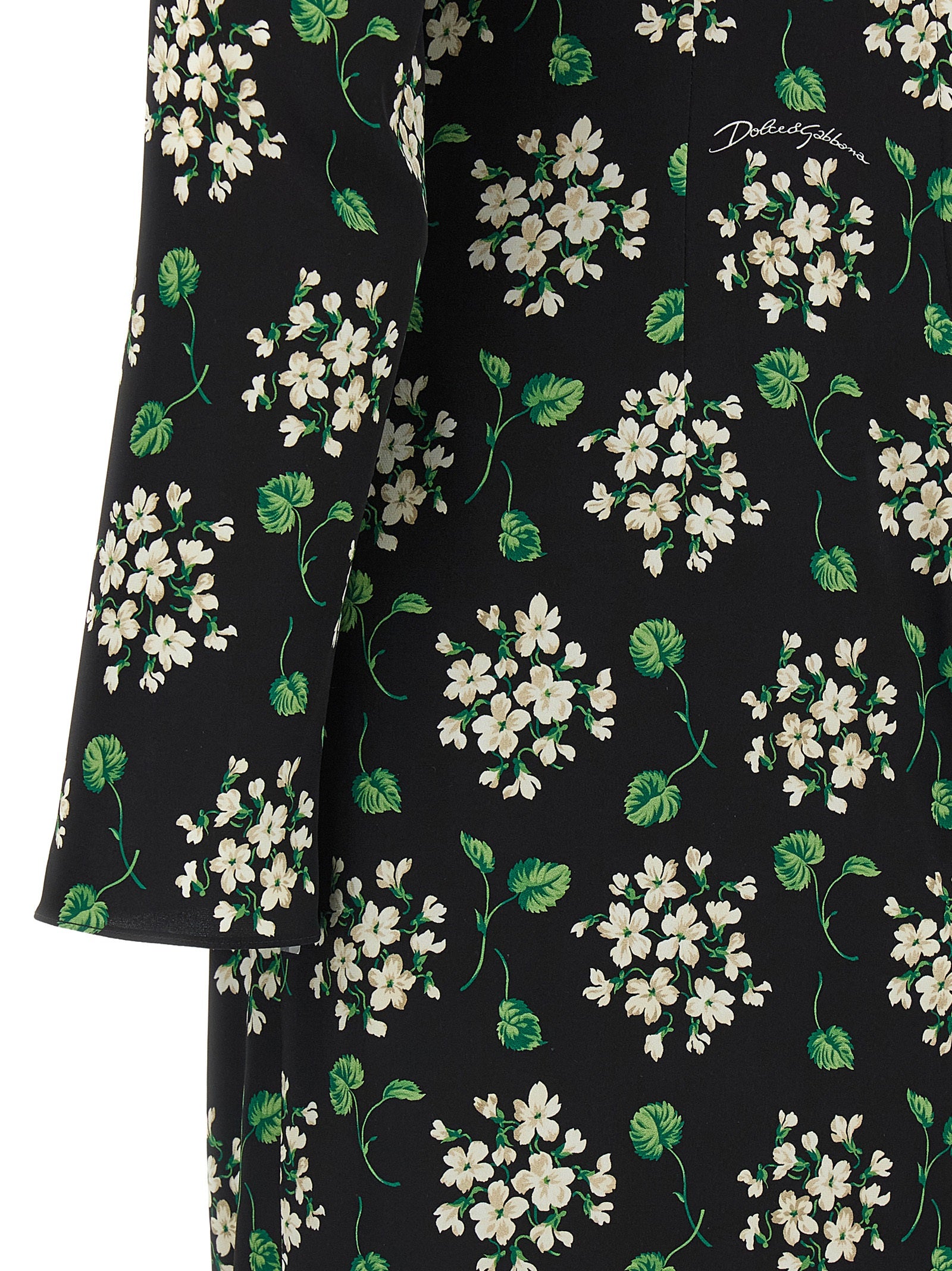 Discover the Dolce & Gabbana Black Synthetic Midi Dress, a silk charmeuse masterpiece that embodies elegance and sophistication, perfect for any luxurious occasion.