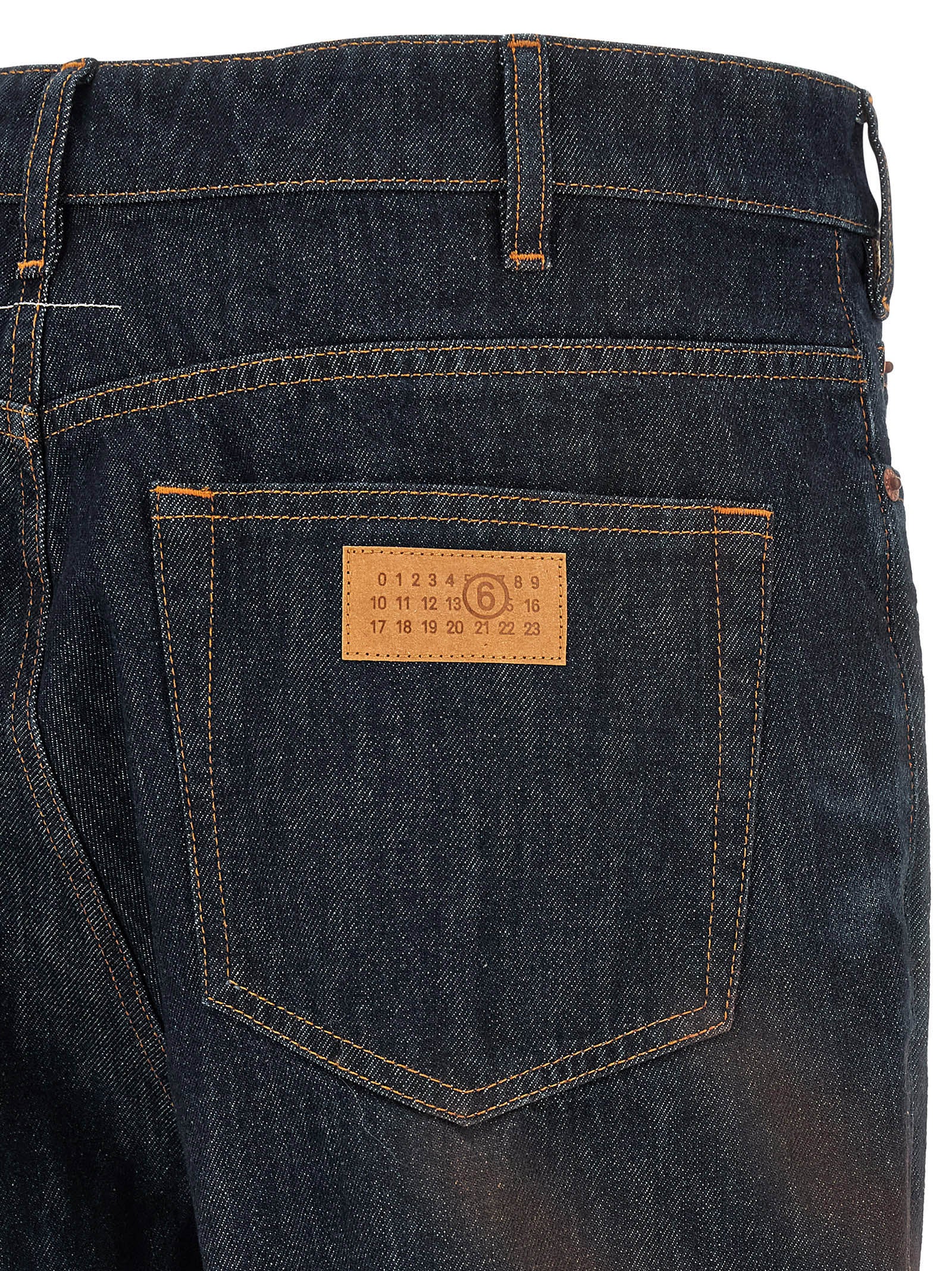 Experience the allure of MM6 Maison Margiela's Blue Cotton Straight-Leg Jeans, where exquisite craftsmanship meets timeless elegance, perfect for the discerning individual.