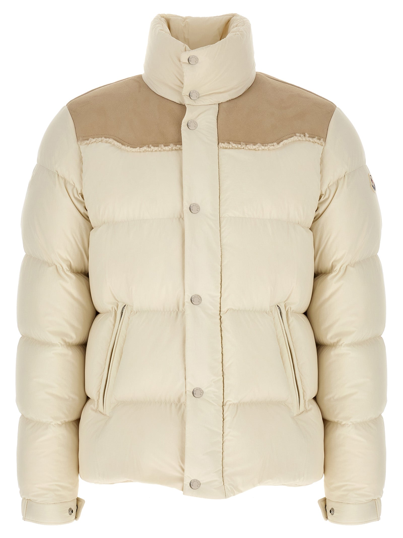 Indulge in the Moncler Beige Polyamide Full-Length Jacket, a masterpiece of quilted nylon and goose down, embodying elegance and warmth for discerning tastes.