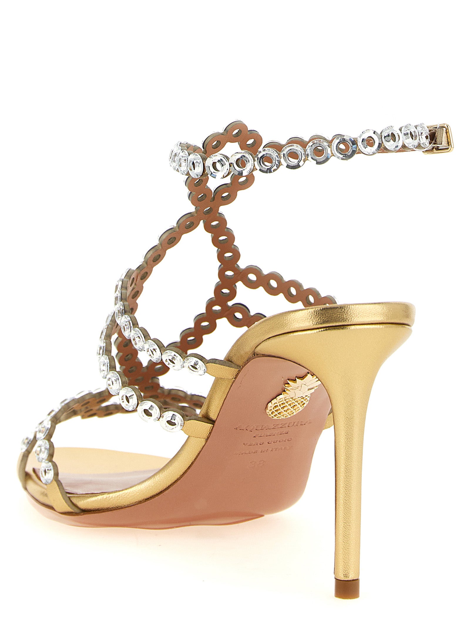 Elevate your elegance with Aquazzura Gold Lamb Leather Stiletto Heel Sandals, a masterpiece of artisanal luxury and timeless sophistication for discerning tastes.